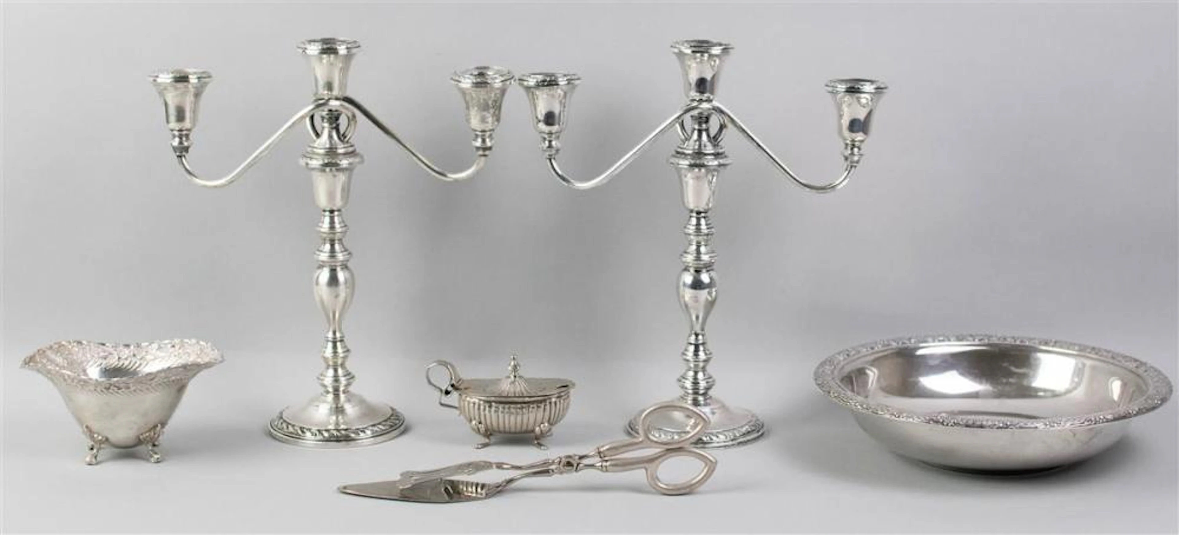 PAIR OF SILVER WEIGHTED THREE-LIGHT CANDELABRA, SILVER BOWL, SILVER BONBON DISH AND AN .800 SILVER MUSTARD POT