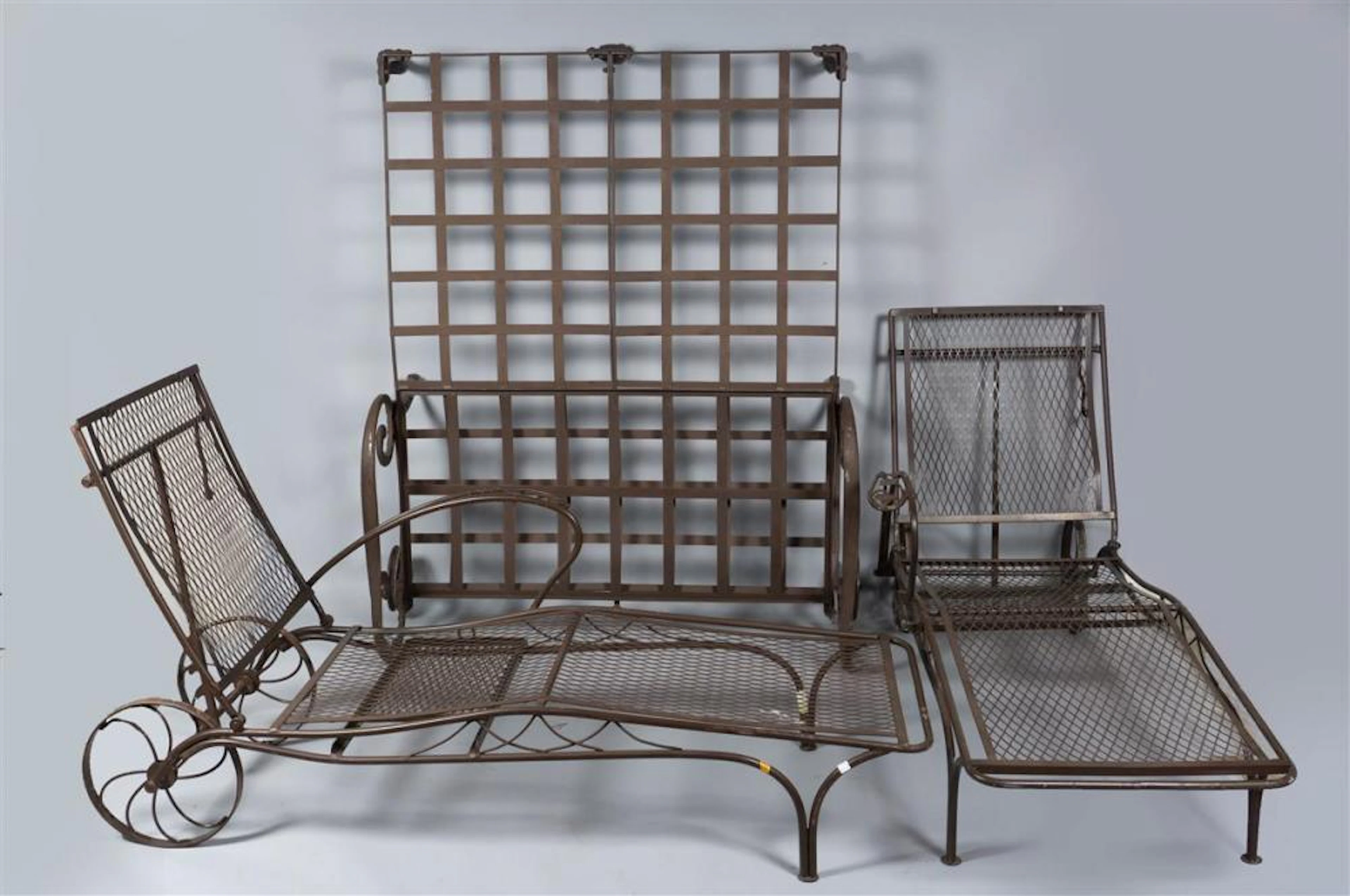 PAIR OF BROWN PAINTED METAL CHAISE LOUNGES AND DOUBLE CHAISE LOUNGE