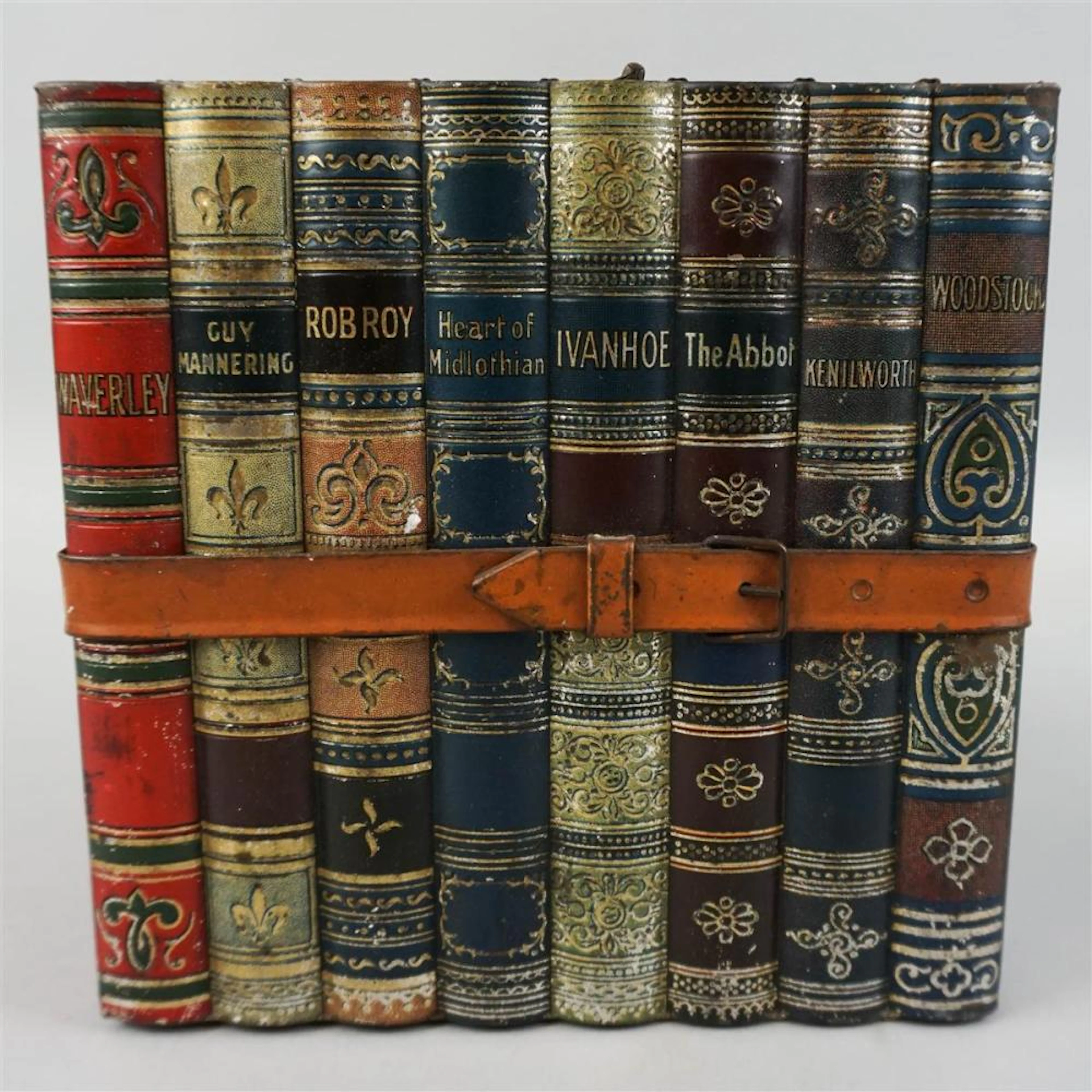 ENGLISH BISCUIT TIN IN THE FORM OF BOOKS BY SIR WALTER SCOTT