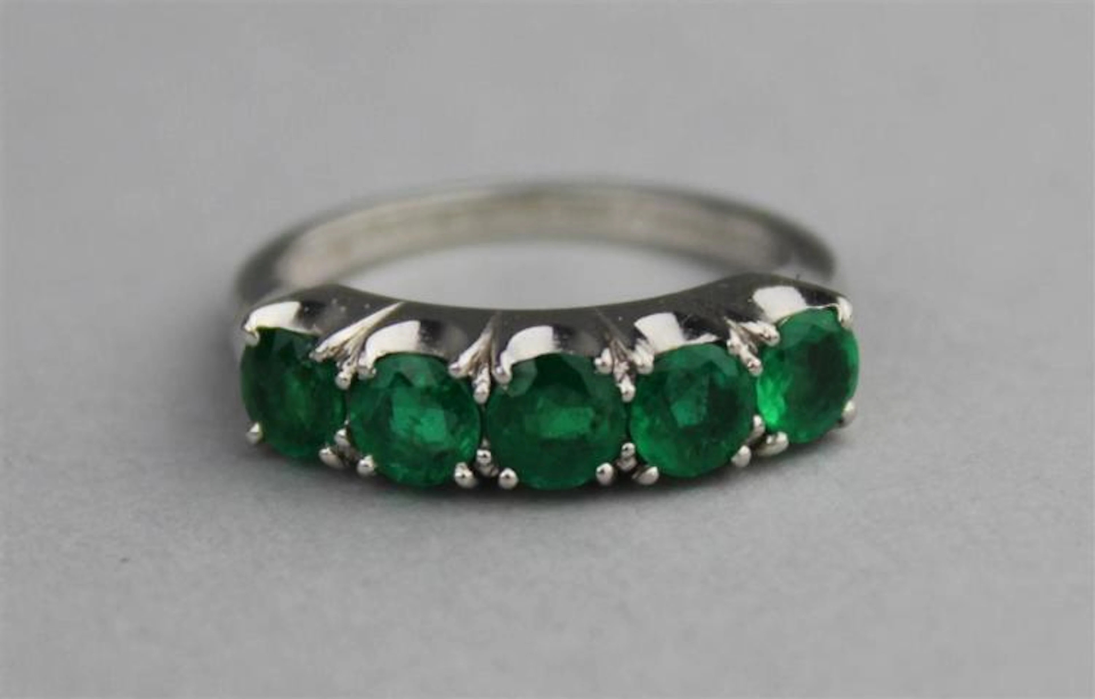 EMERALD AND PLATINUM RING