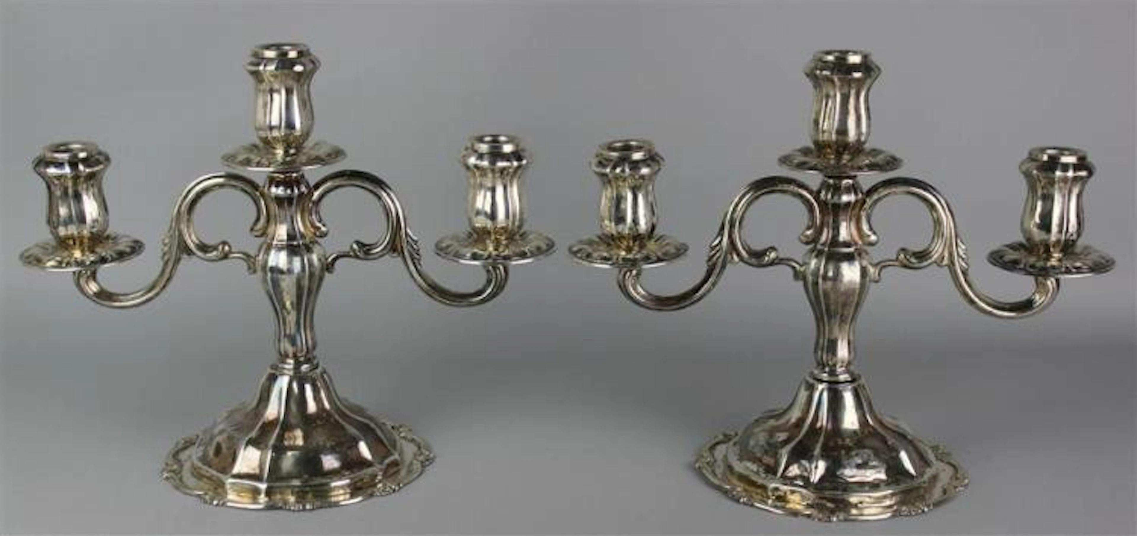 PAIR OF PERUVIAN SILVER THREE-LIGHT CANDELABRA