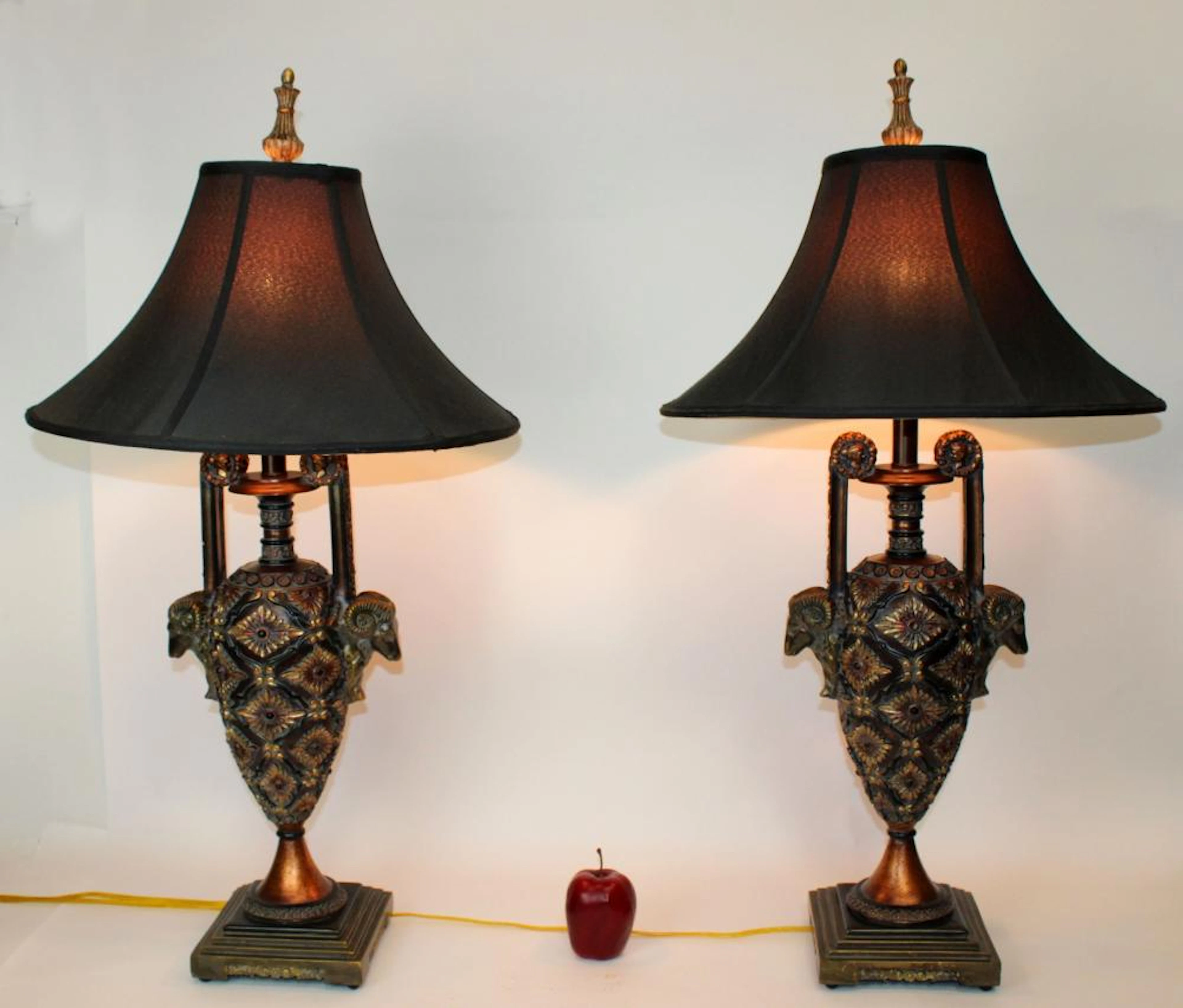 Pair of urn form buffet lamps with rams' heads