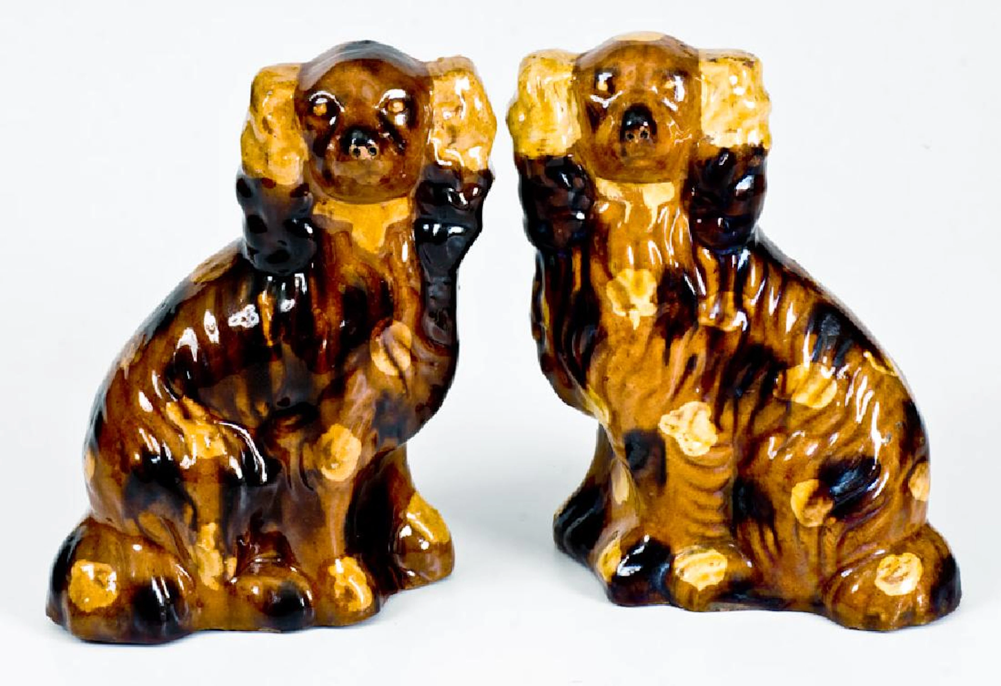 Fine Pair of Redware Spaniels with Yellow and Brown