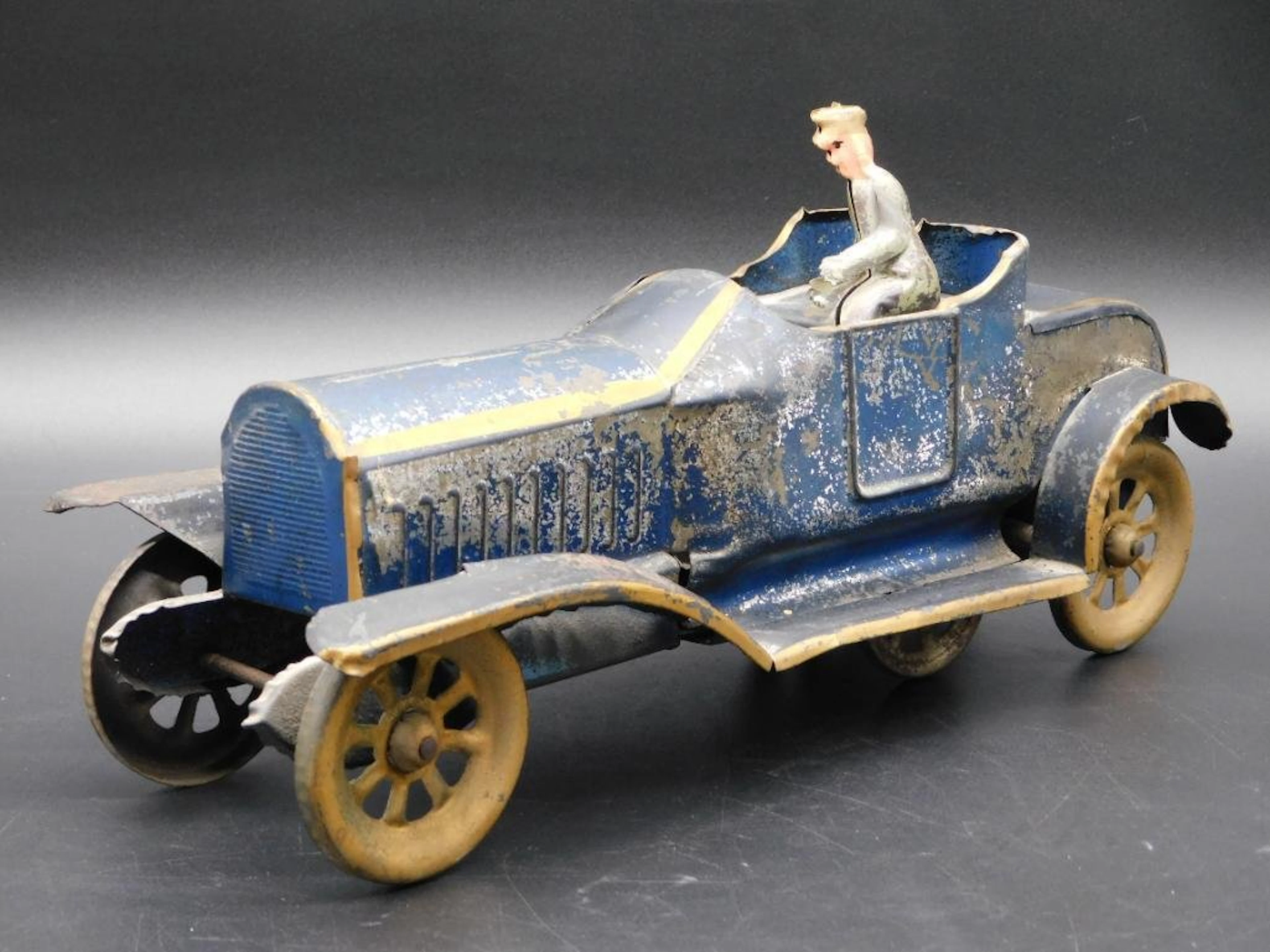BLUE METAL CAR WITH DRIVER TOY DOES NOT WORK