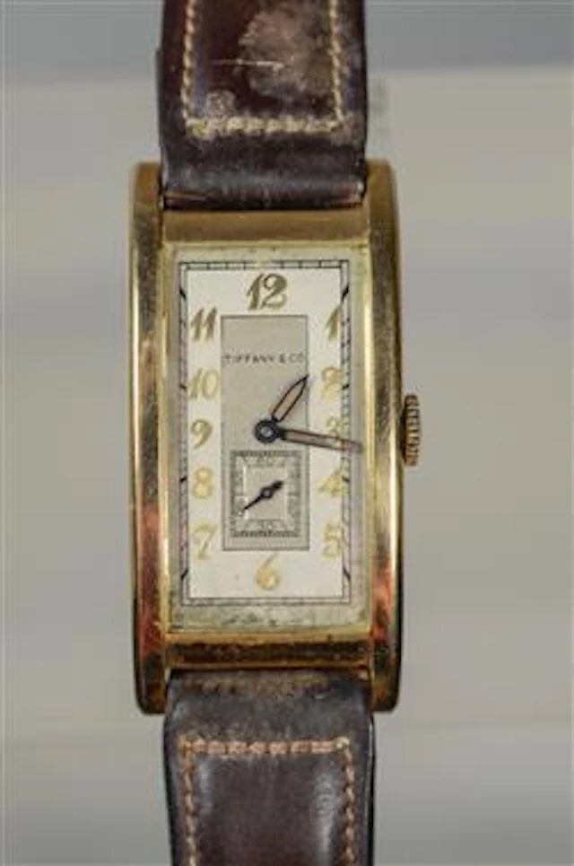 14K YG Tiffany & Co men's tank wrist watch by Movado Factories