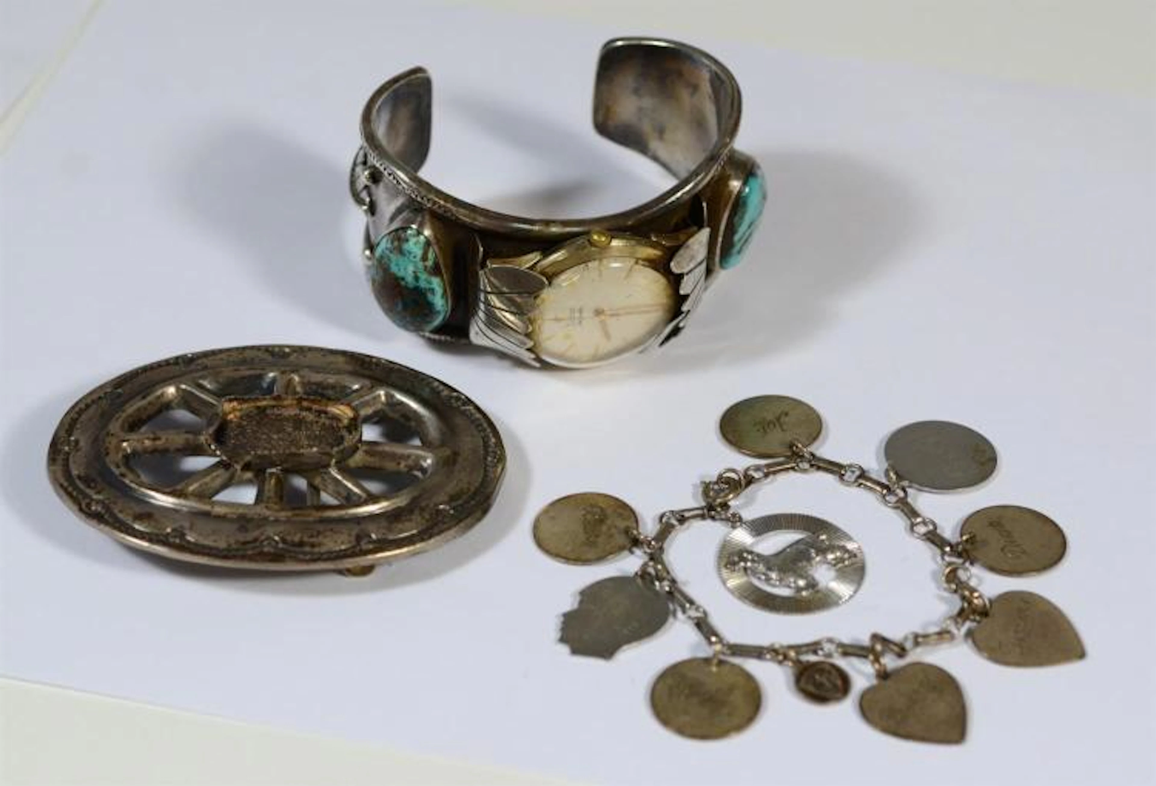Mans silver cuff bracelet with 2 large turquoise and a watch