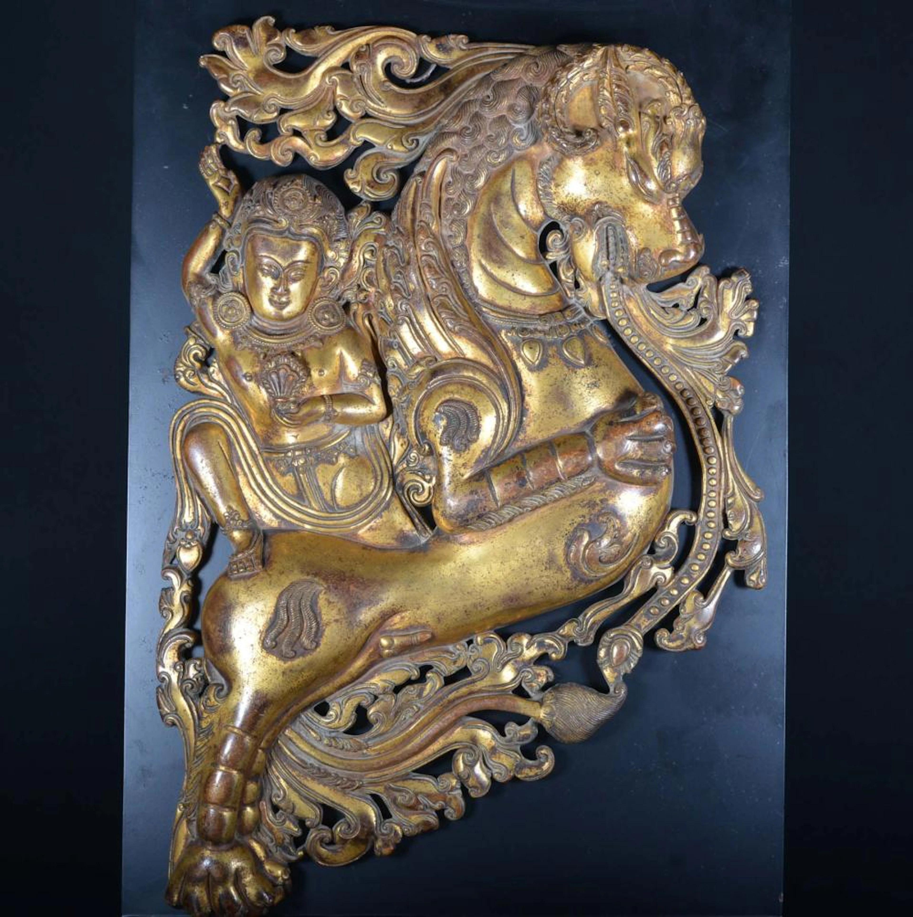 A GILT-BRONZE BUDDHIST WALL PENDANT.MING YONGLE PERIOD