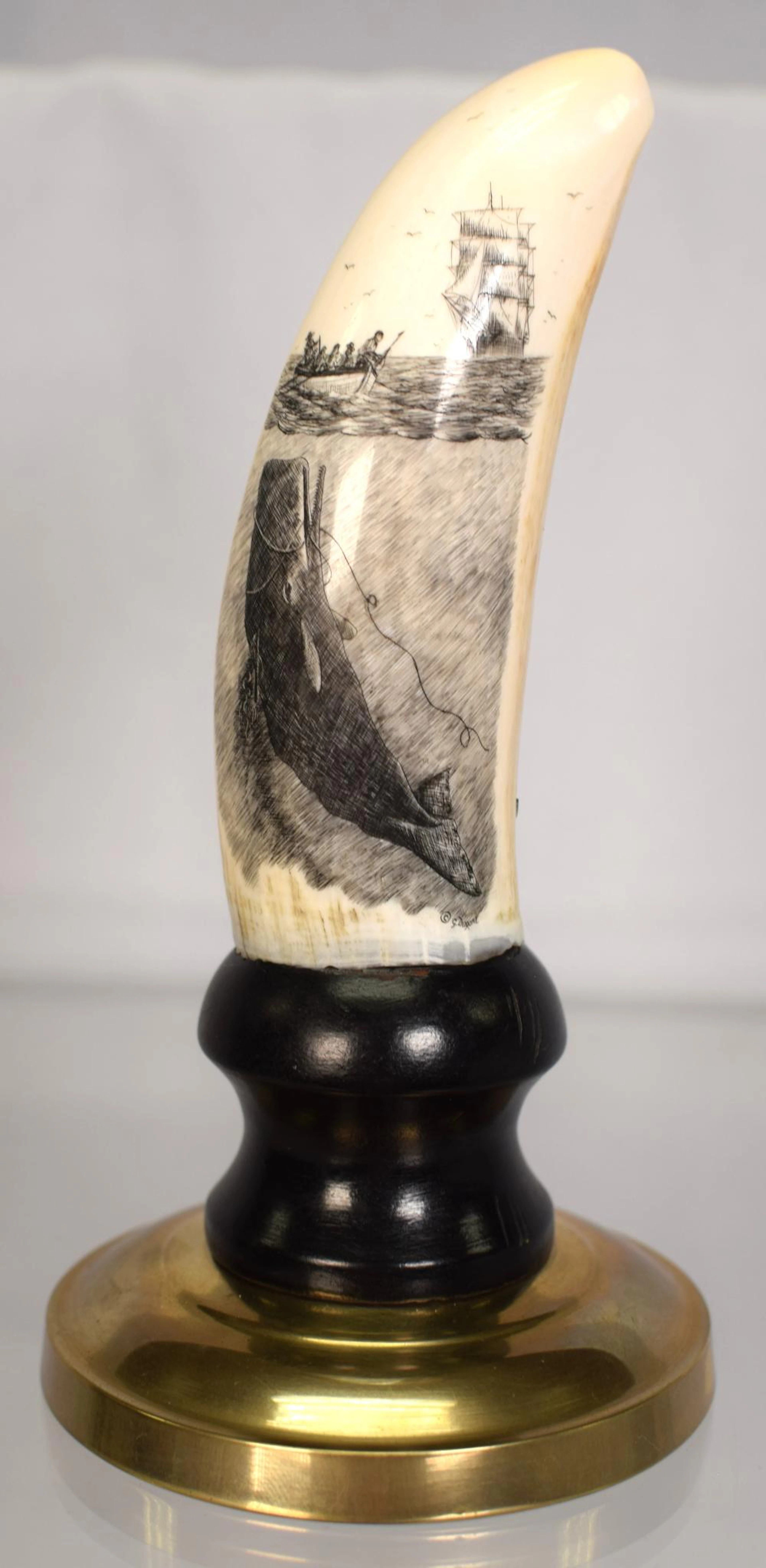GERRY DUPONT SCRIMSHAW WHALES TOOTH ON STAND
