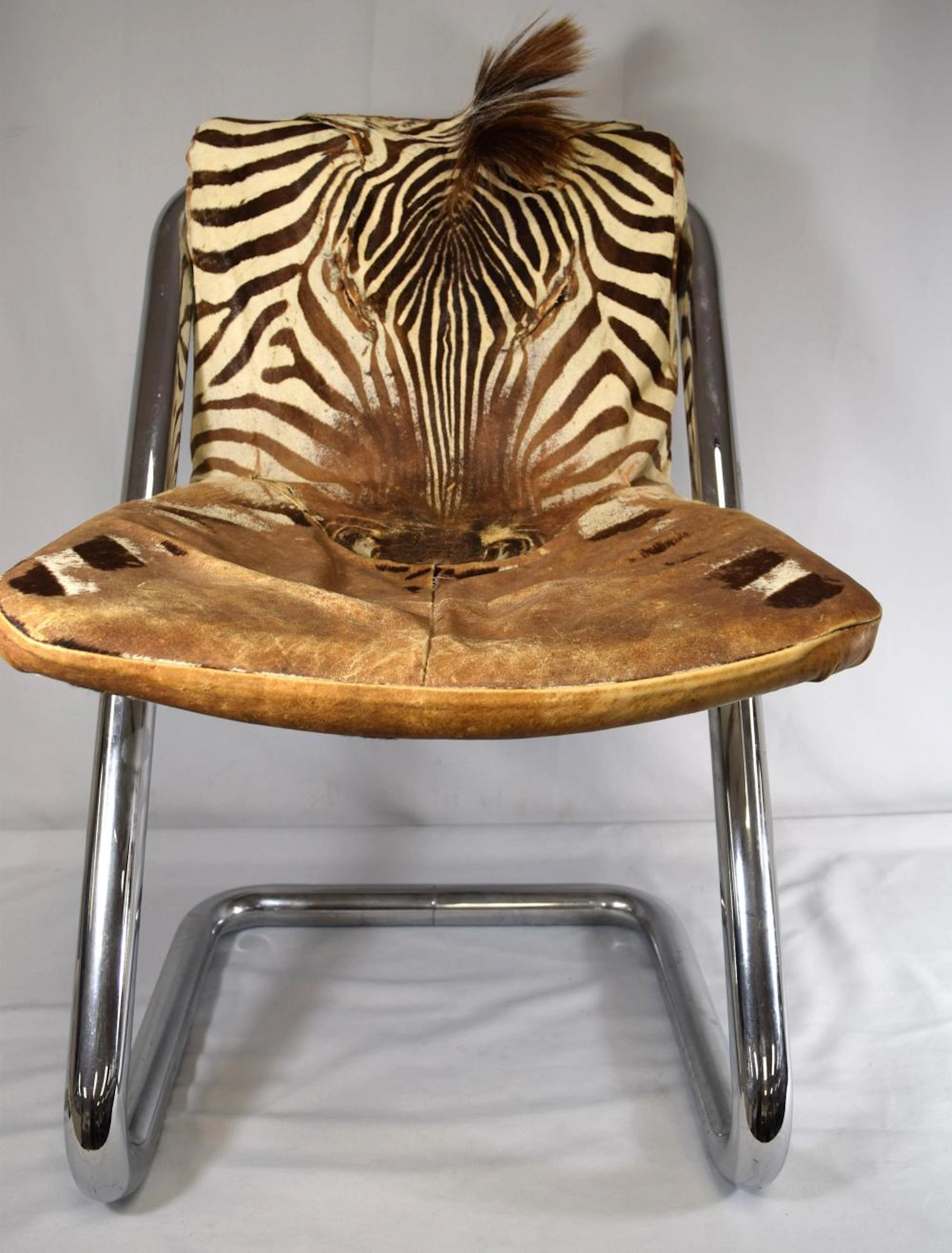 KARL SPRINGER STYLE WILD ZEBRA HIDE COVERED CHAIR: