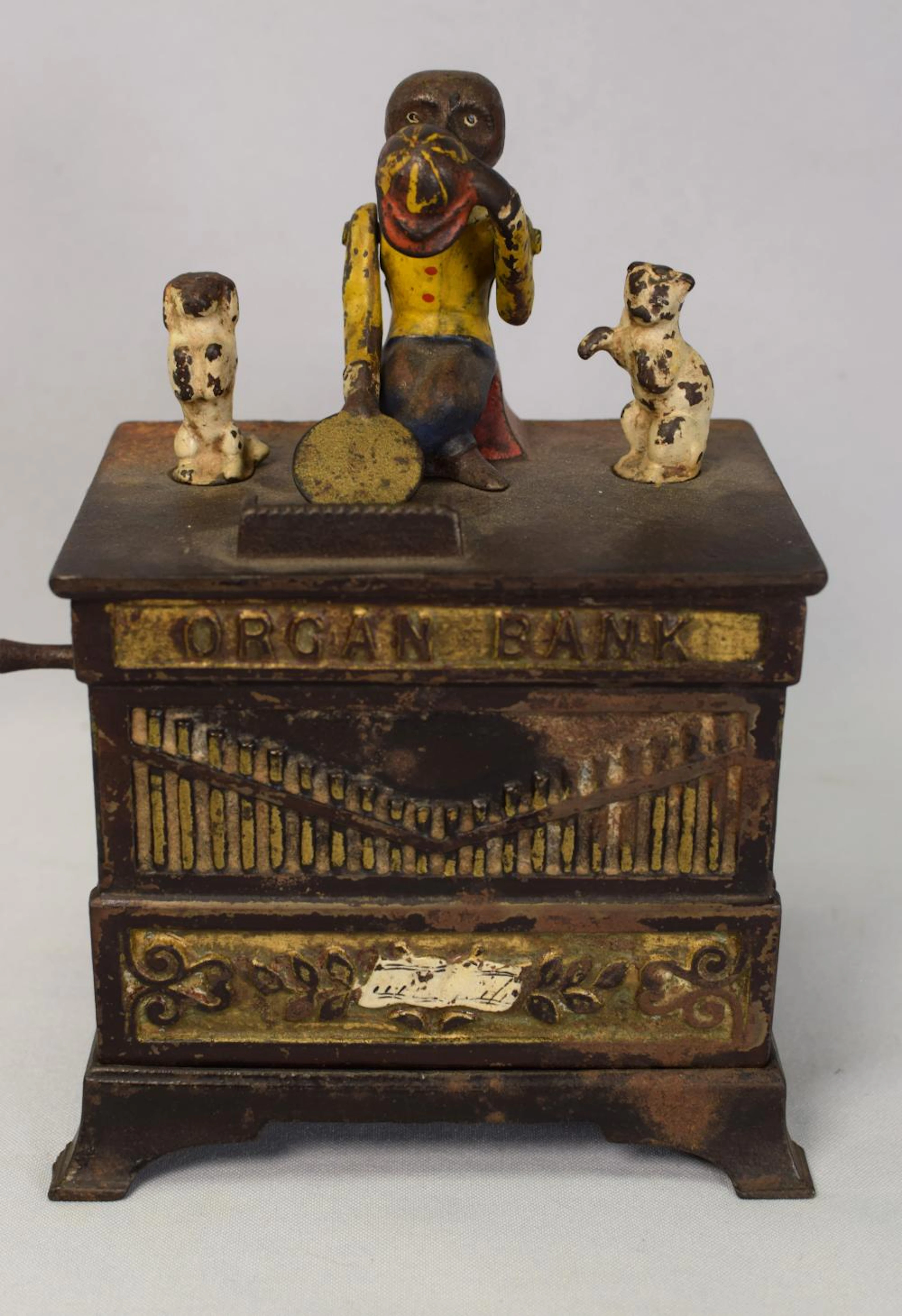 ANTIQUE ORGAN GRINDER MECHANICAL CAST IRON BANK
