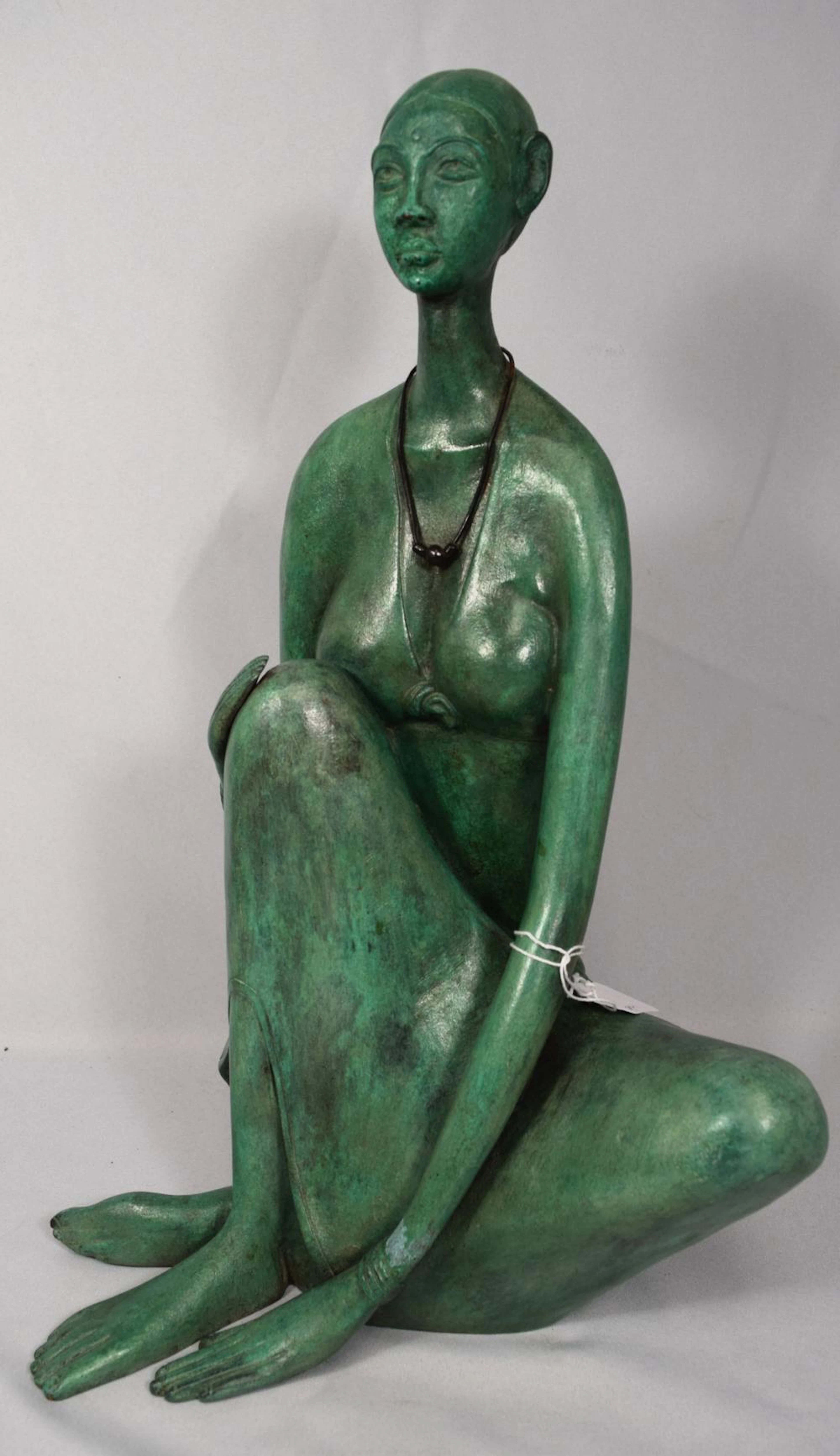 B. PRABHA (INDIA 1933-2001) BRONZE UNTITLED SITTING VILLAGE LADY: 