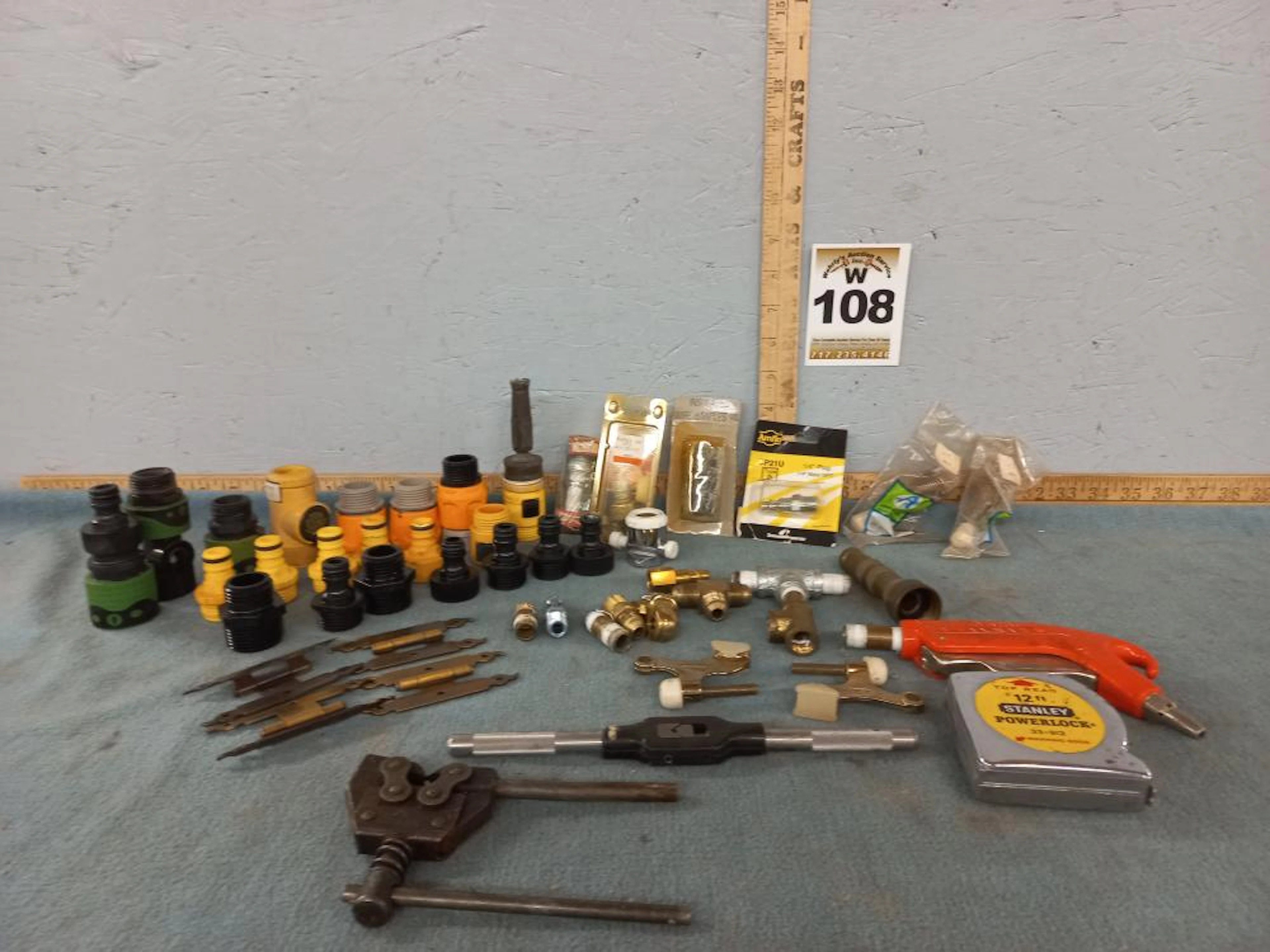 Box lot: Spark plugs/Connectors/Tape measure