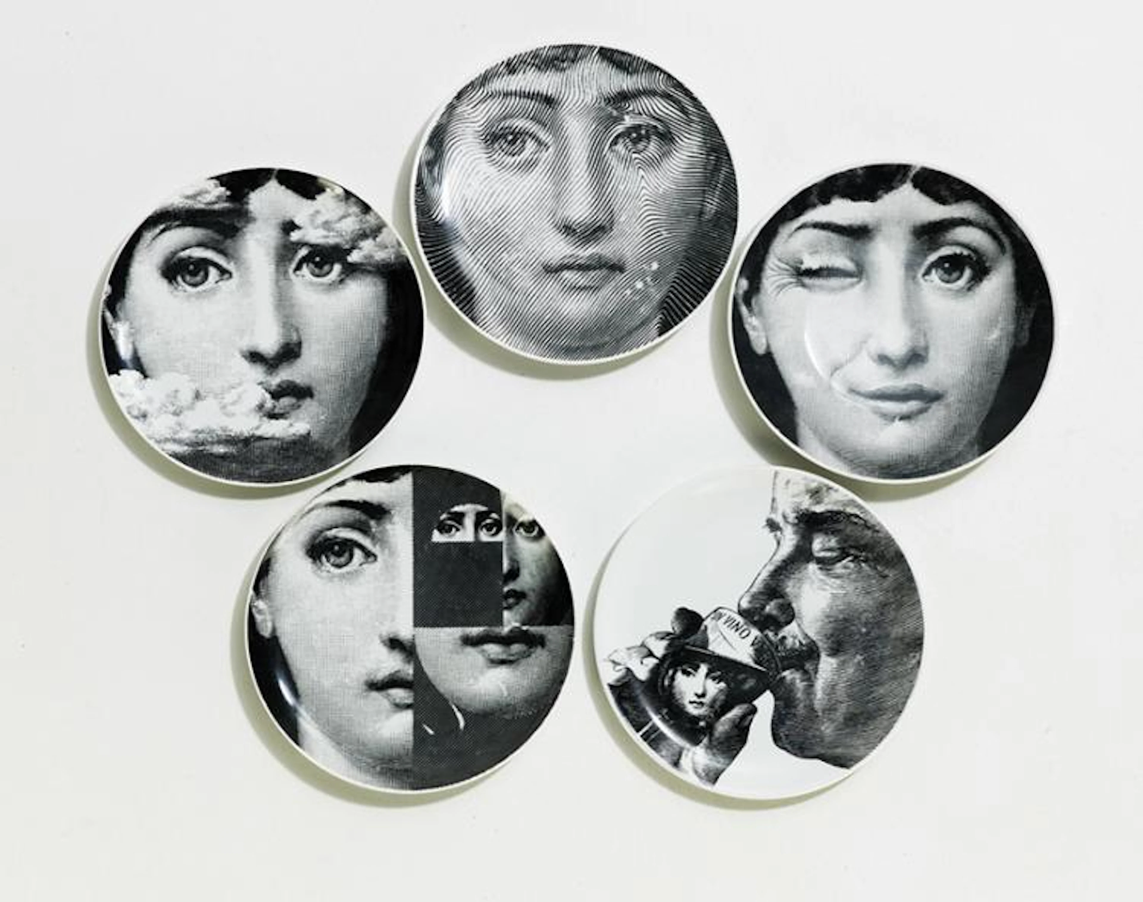 Five Piero Fornasetti (Italian, 1913-1988) Plates