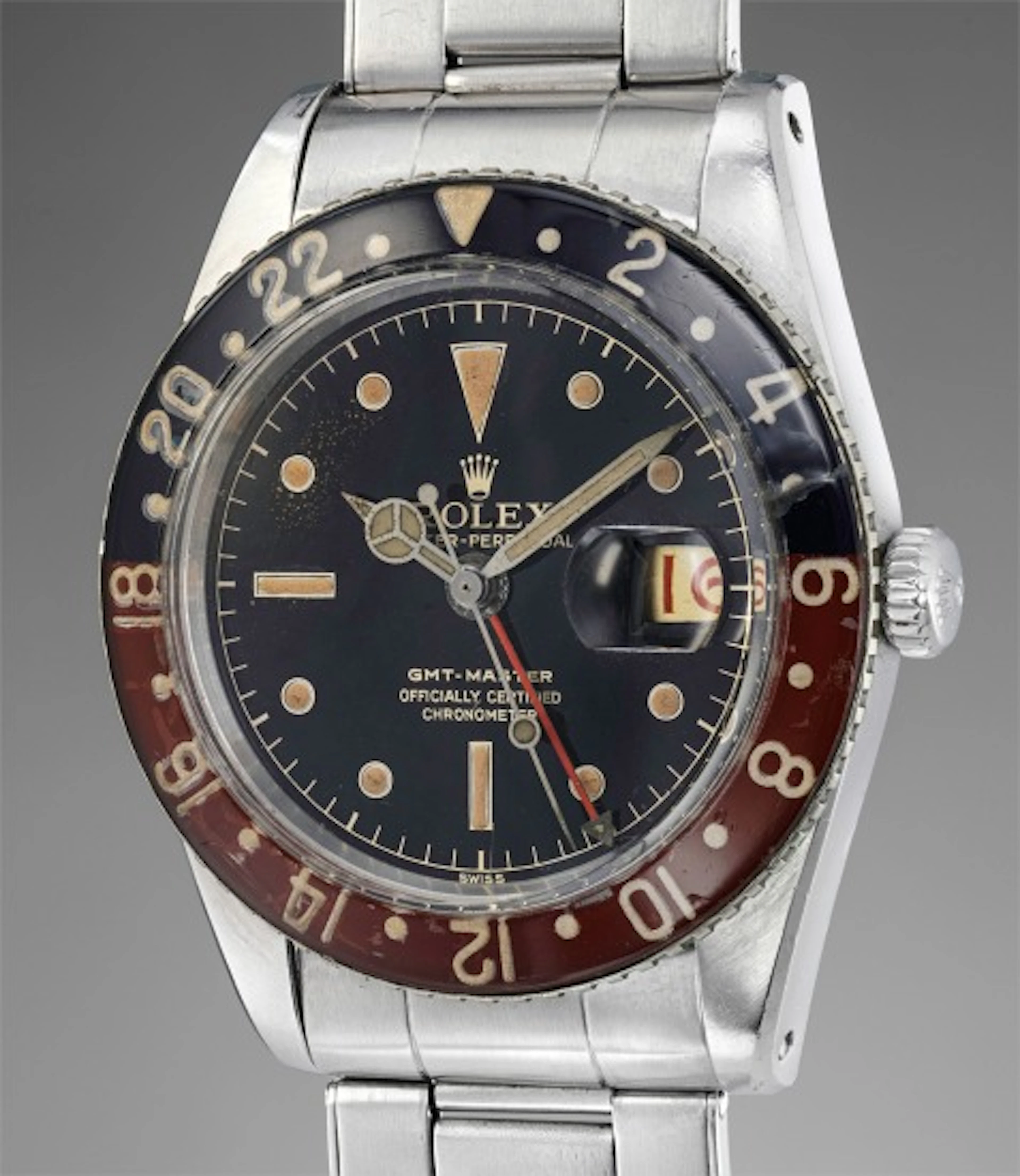 A rare and well-preserved stainless steel wristwatch with dual time