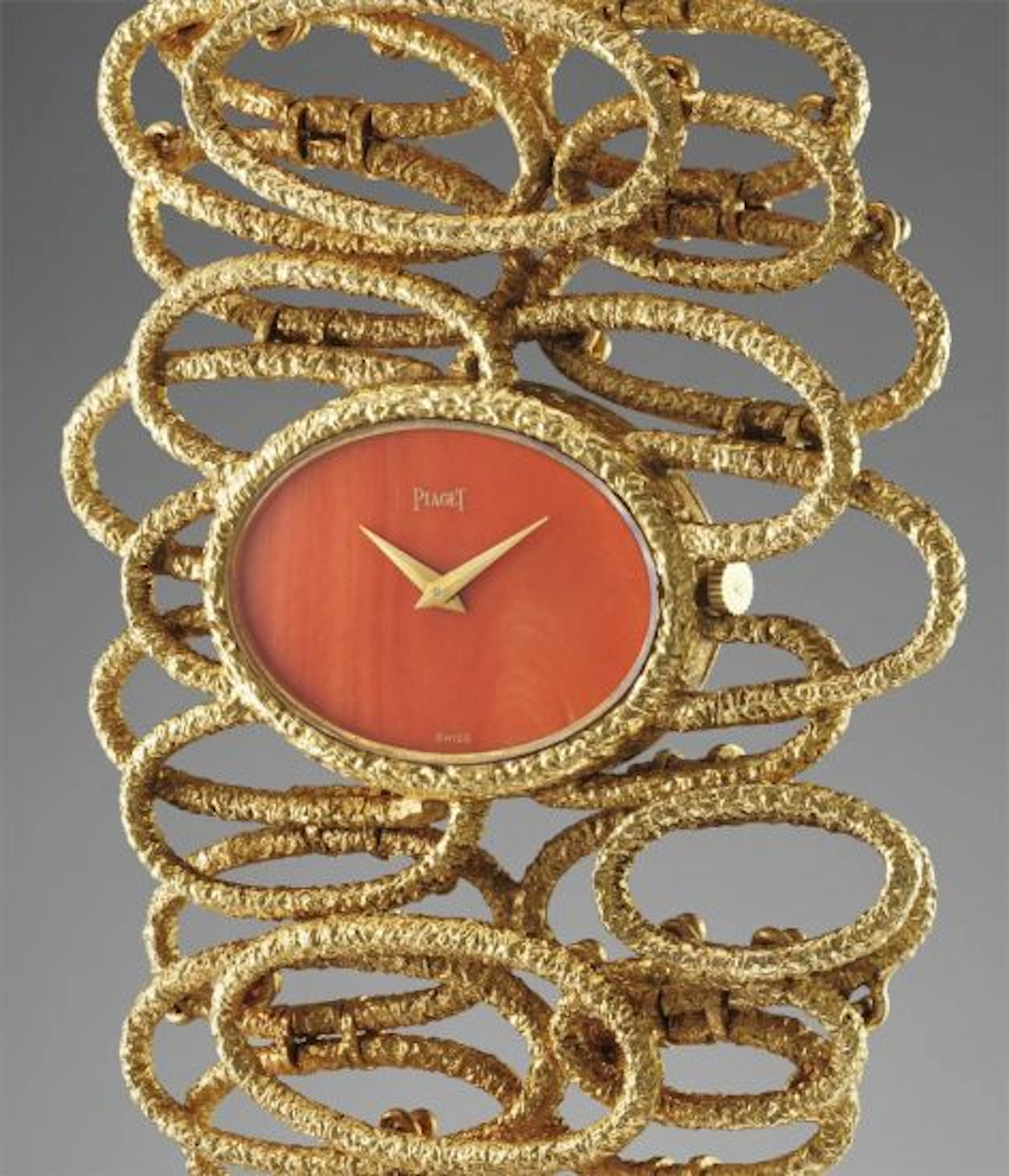 A very attractive and exclusive yellow gold openwork textured bangle