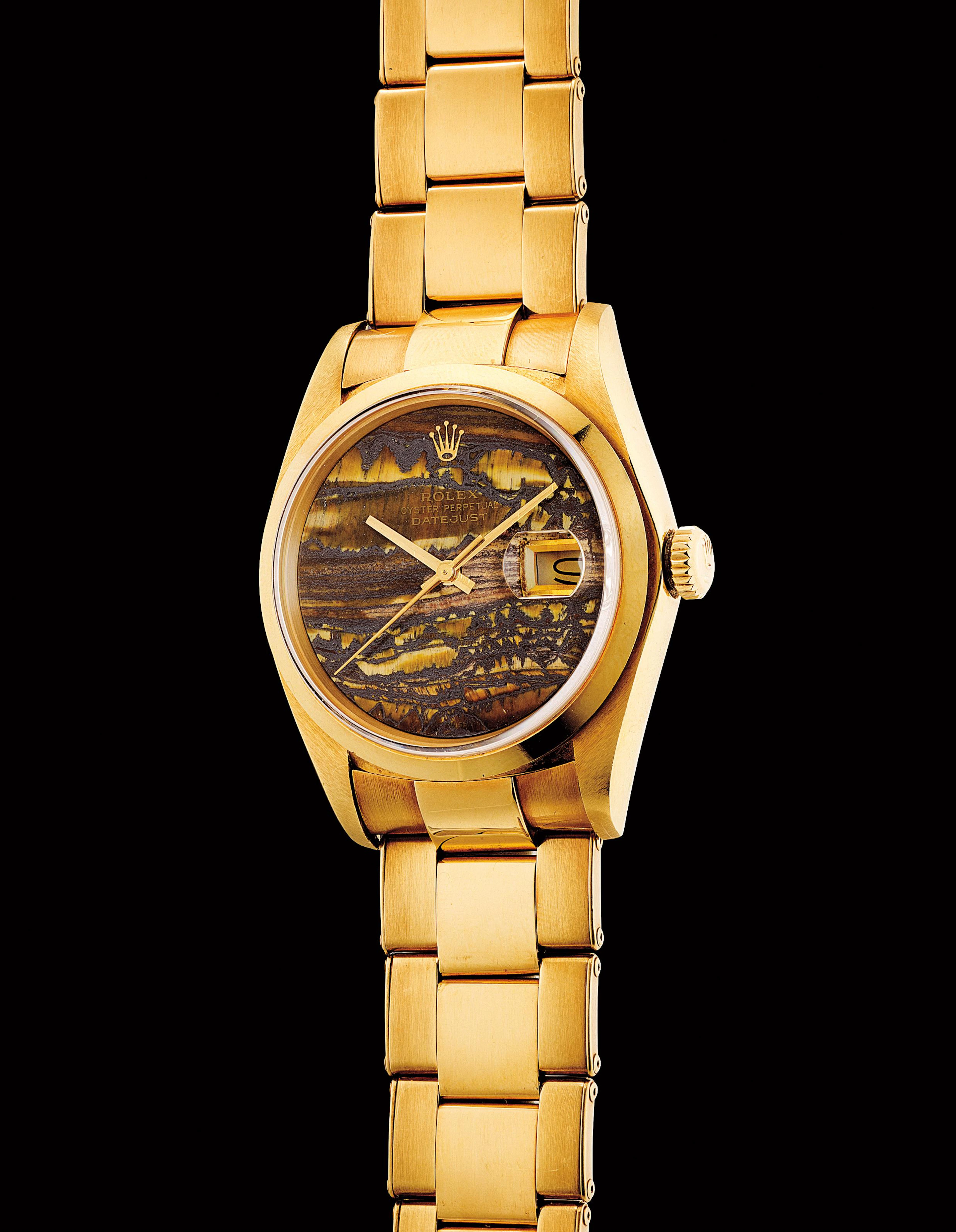A very fine and very rare yellow gold wristwatch with sweep centre seconds, date, obsidian hardstone dial and bracelet, 1979 – Rolex