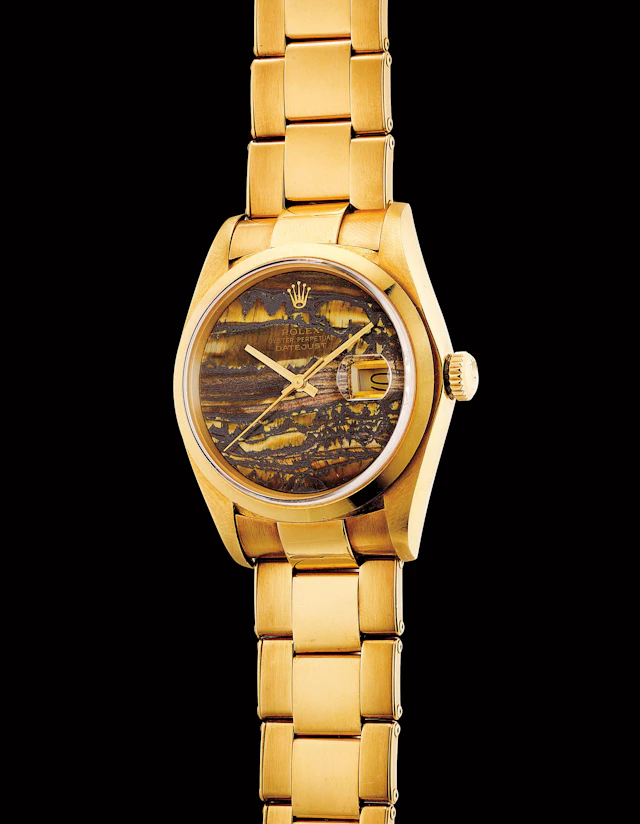 A very fine and very rare yellow gold wristwatch with sweep centre seconds, date, obsidian hardstone dial and bracelet, 1979 – Rolex