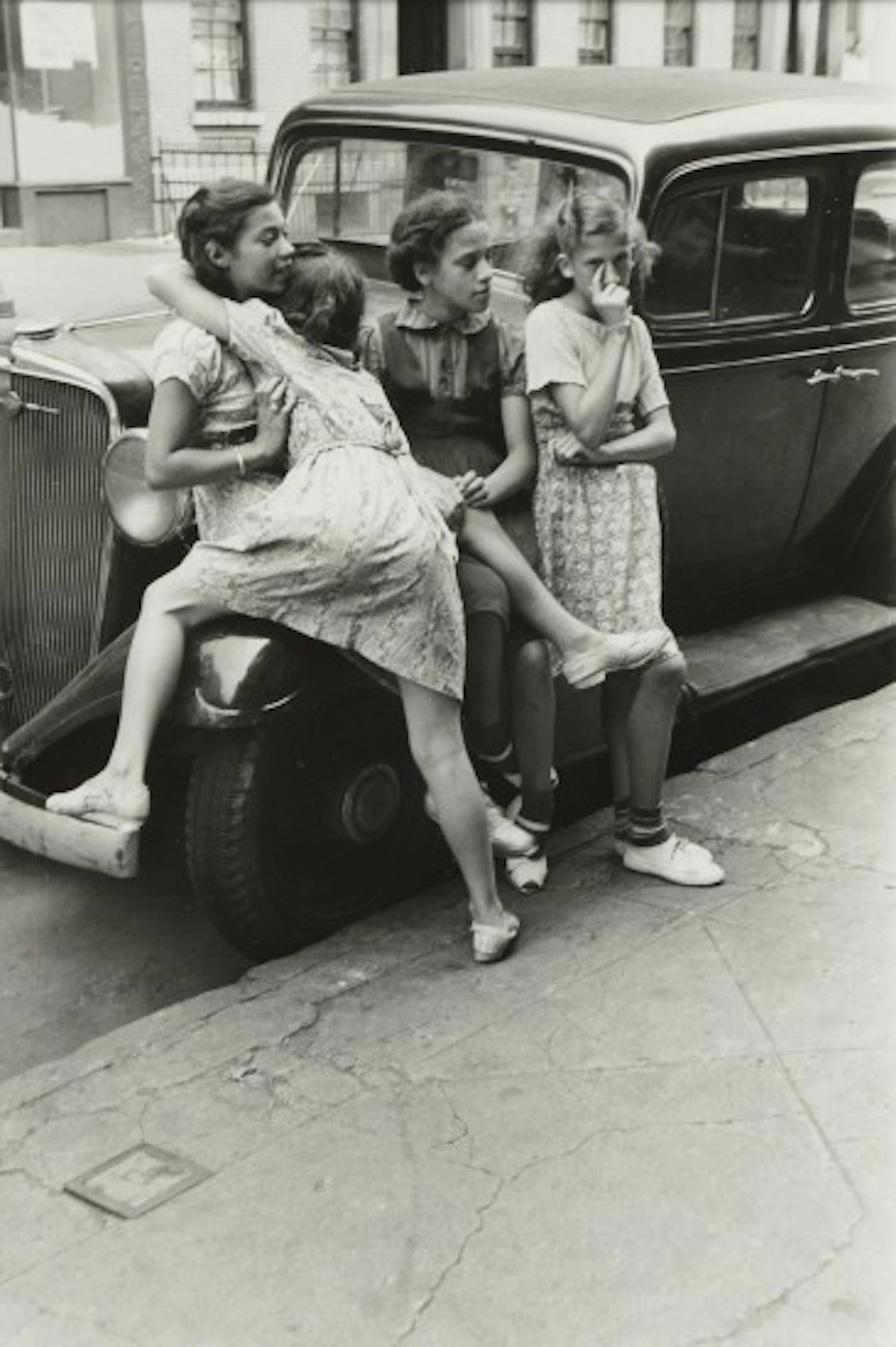 Helen Levitt - N.Y. (four girls against car)