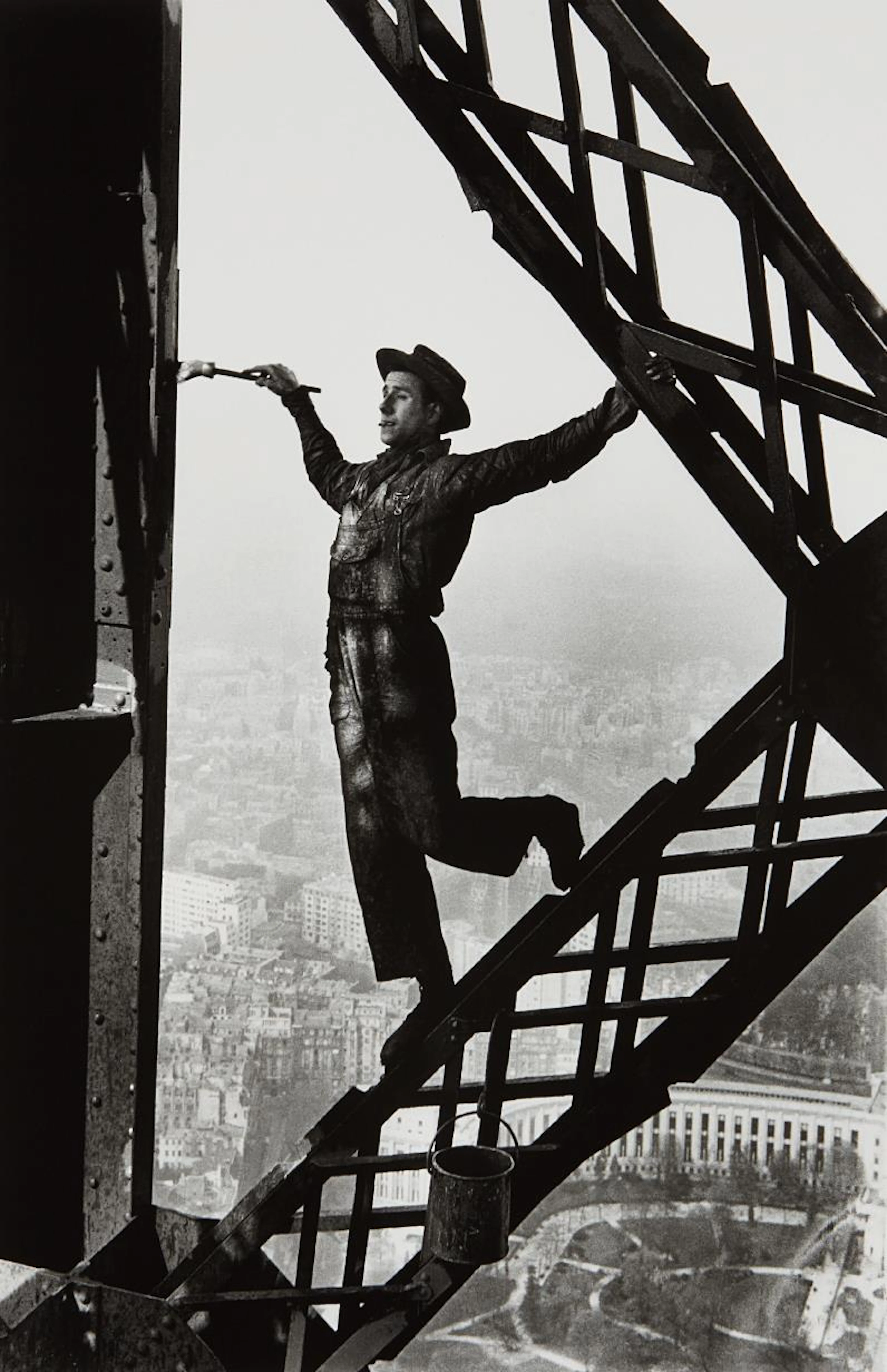 Painter on the Eiffel Tower, Paris, France, 1953 – Marc Riboud