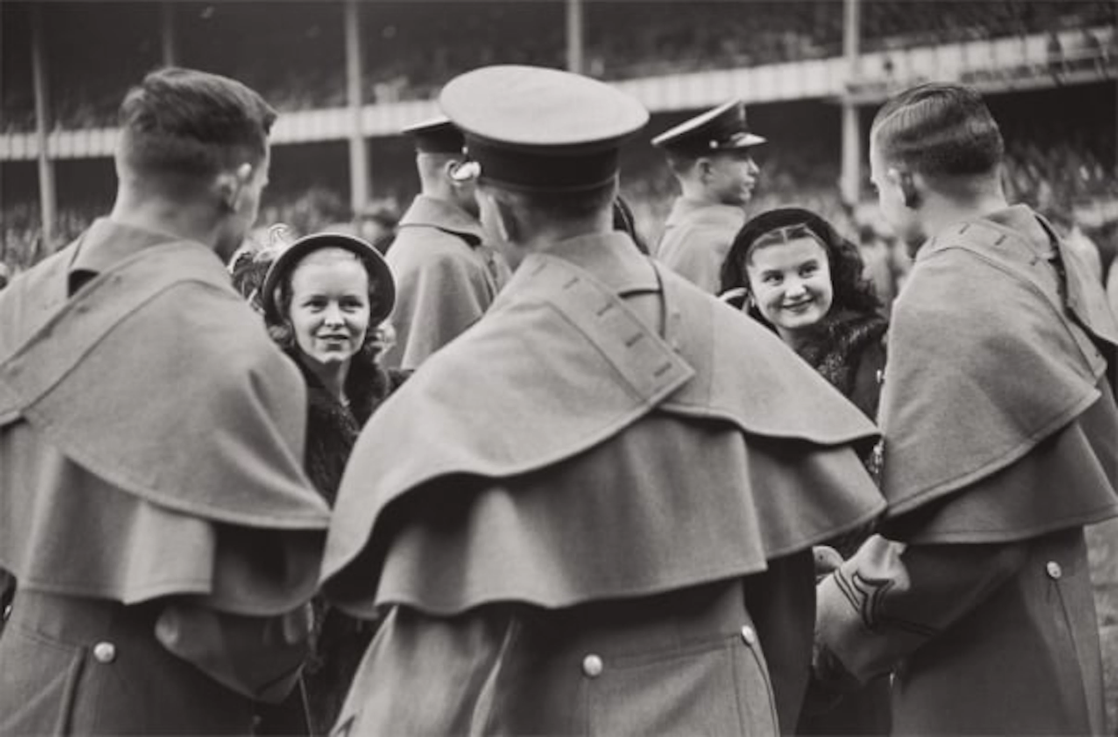 West Point cadets and their admiring young ladies attend the Army