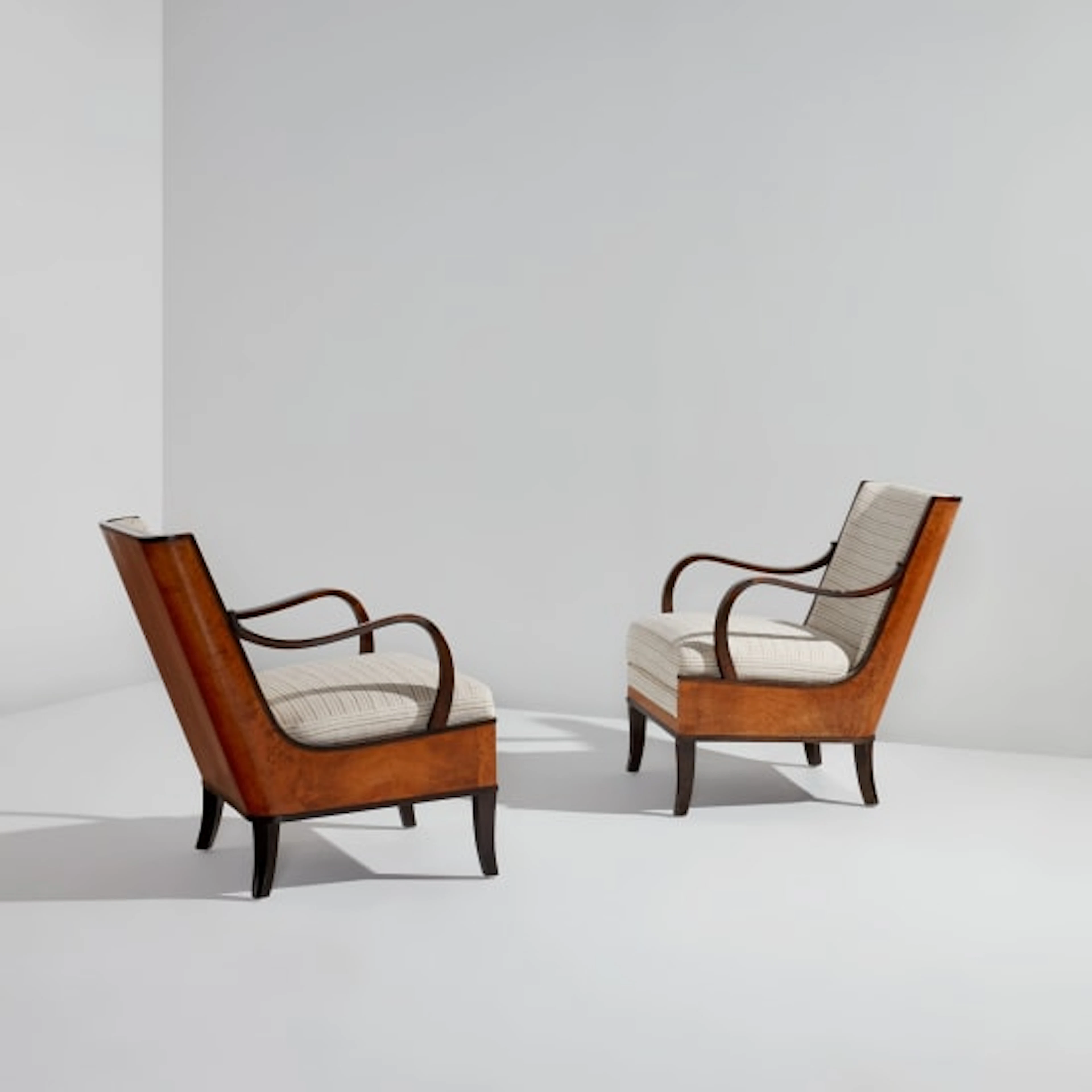 Attributed to Erik Chambert - Pair of armchairs