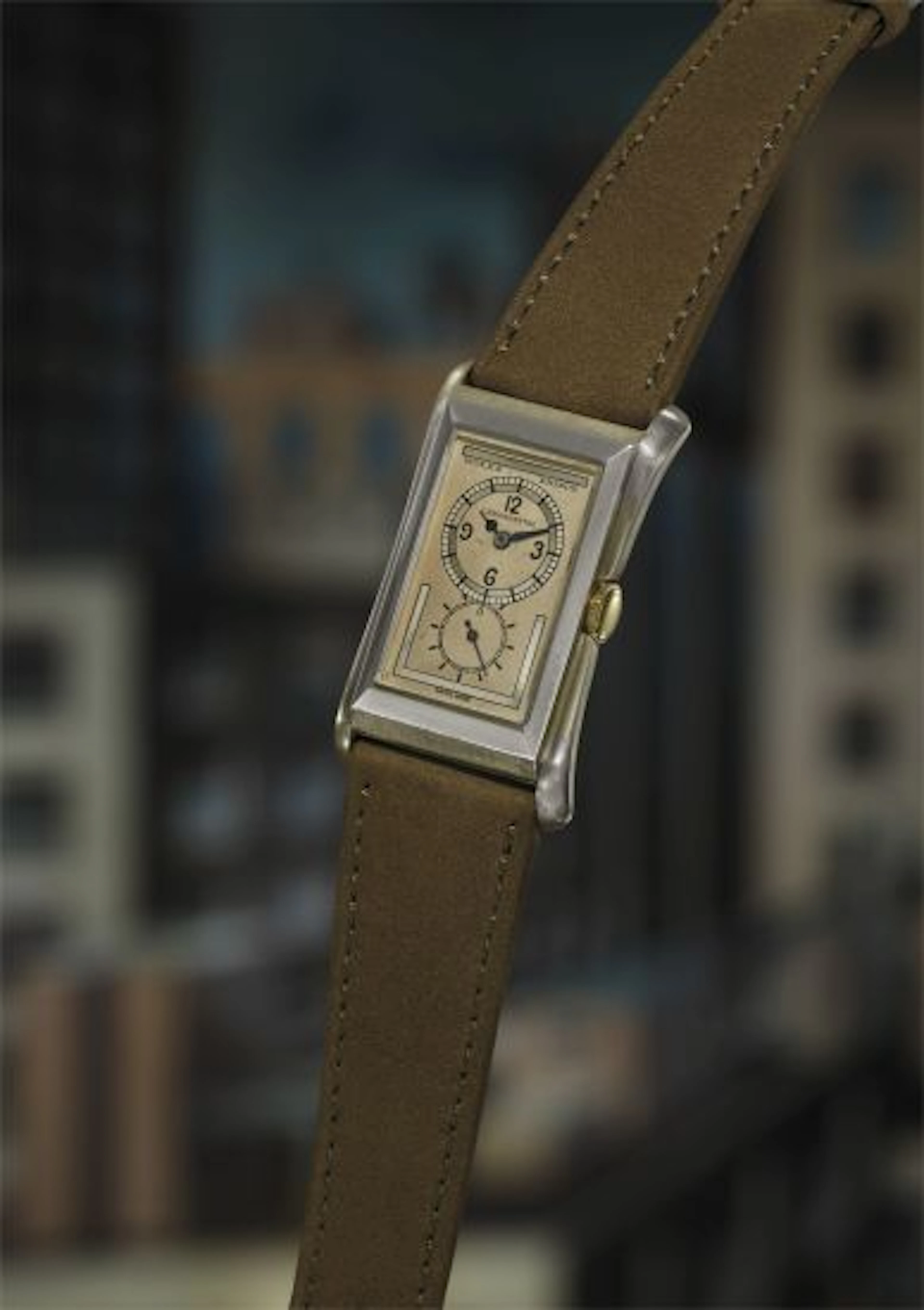 A rare and well-preserved silver rectangular wristwatch with flared