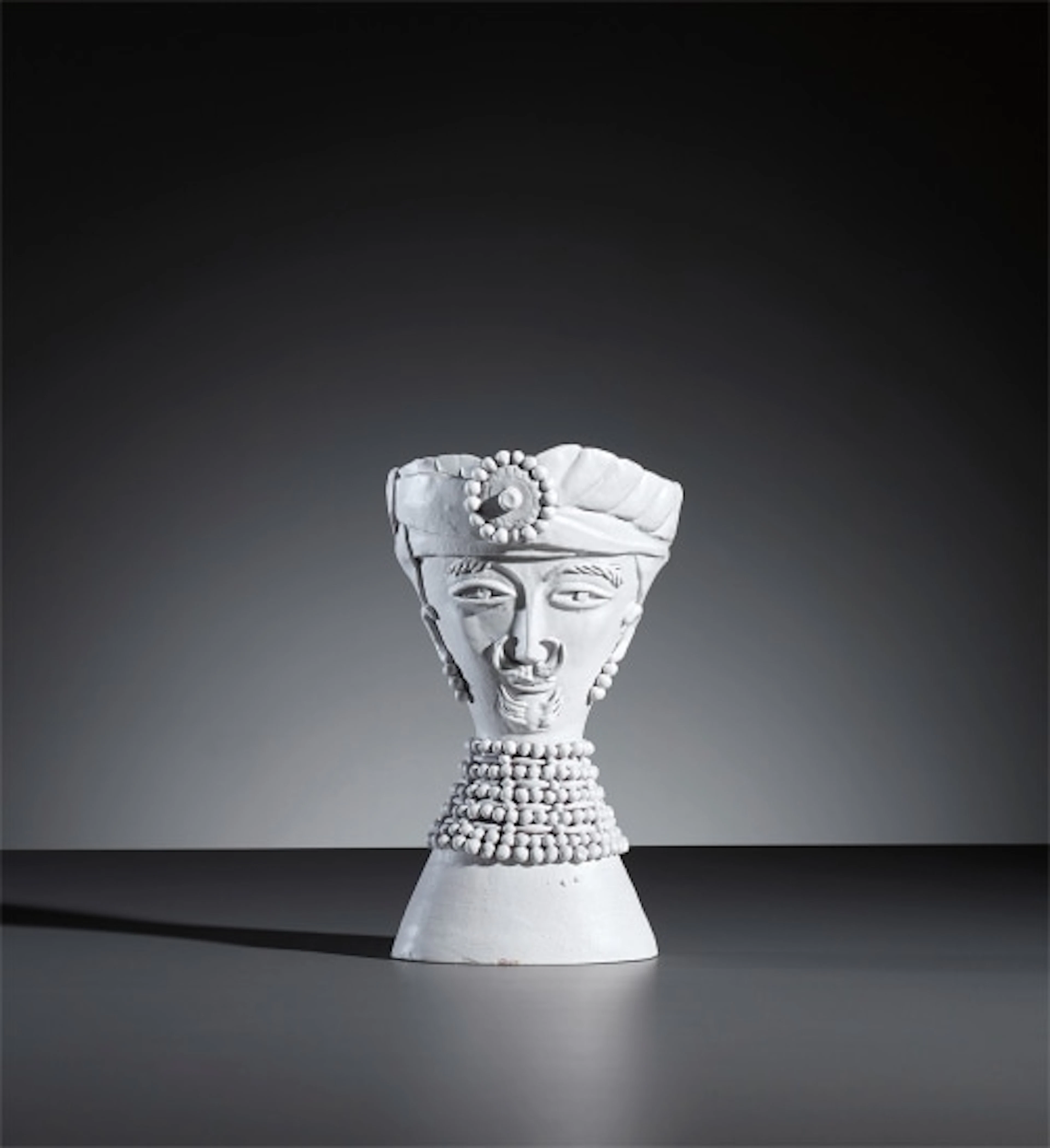 Man with turban statuette
