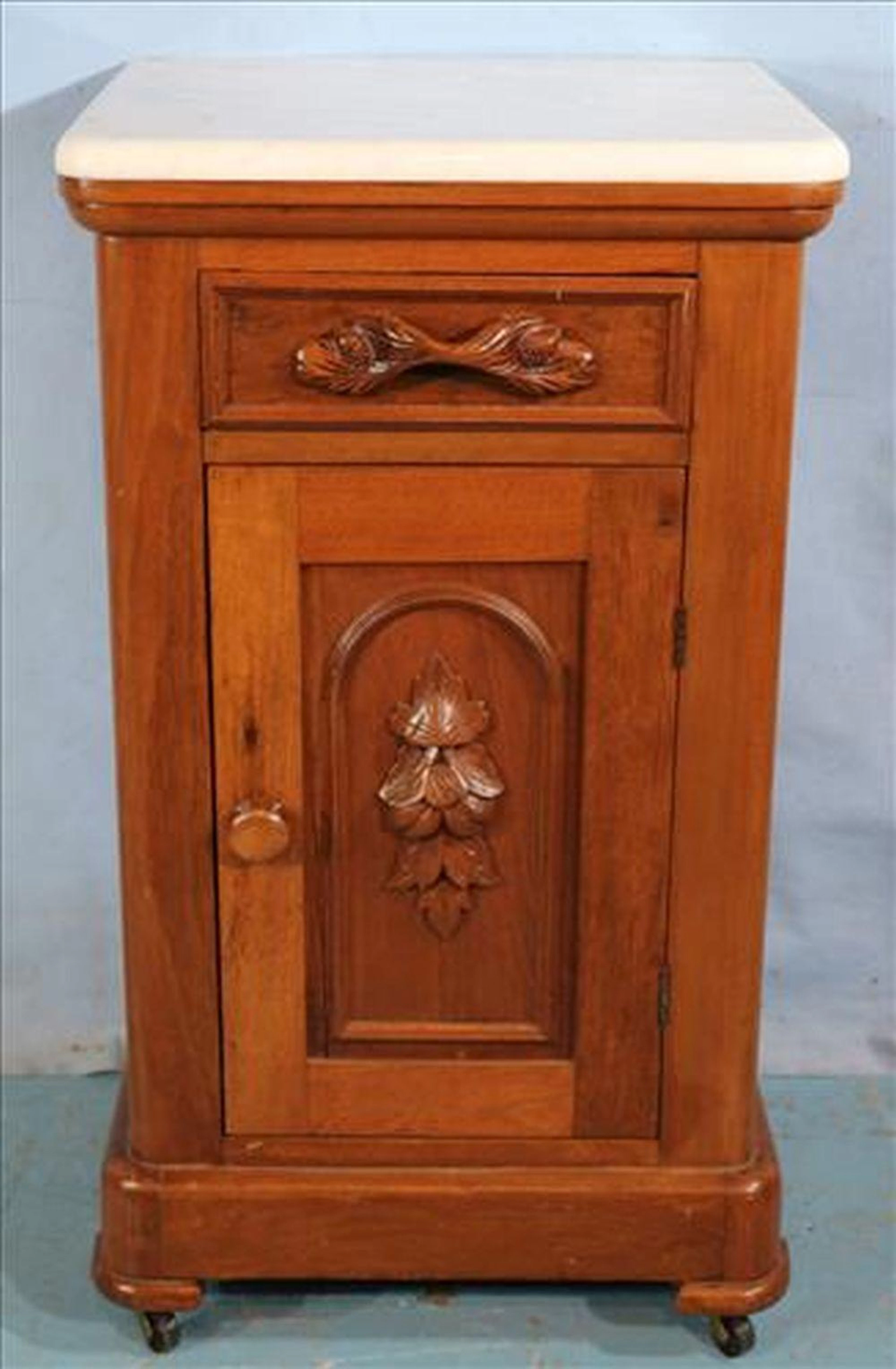 Walnut Victorian half commode with wood pulls