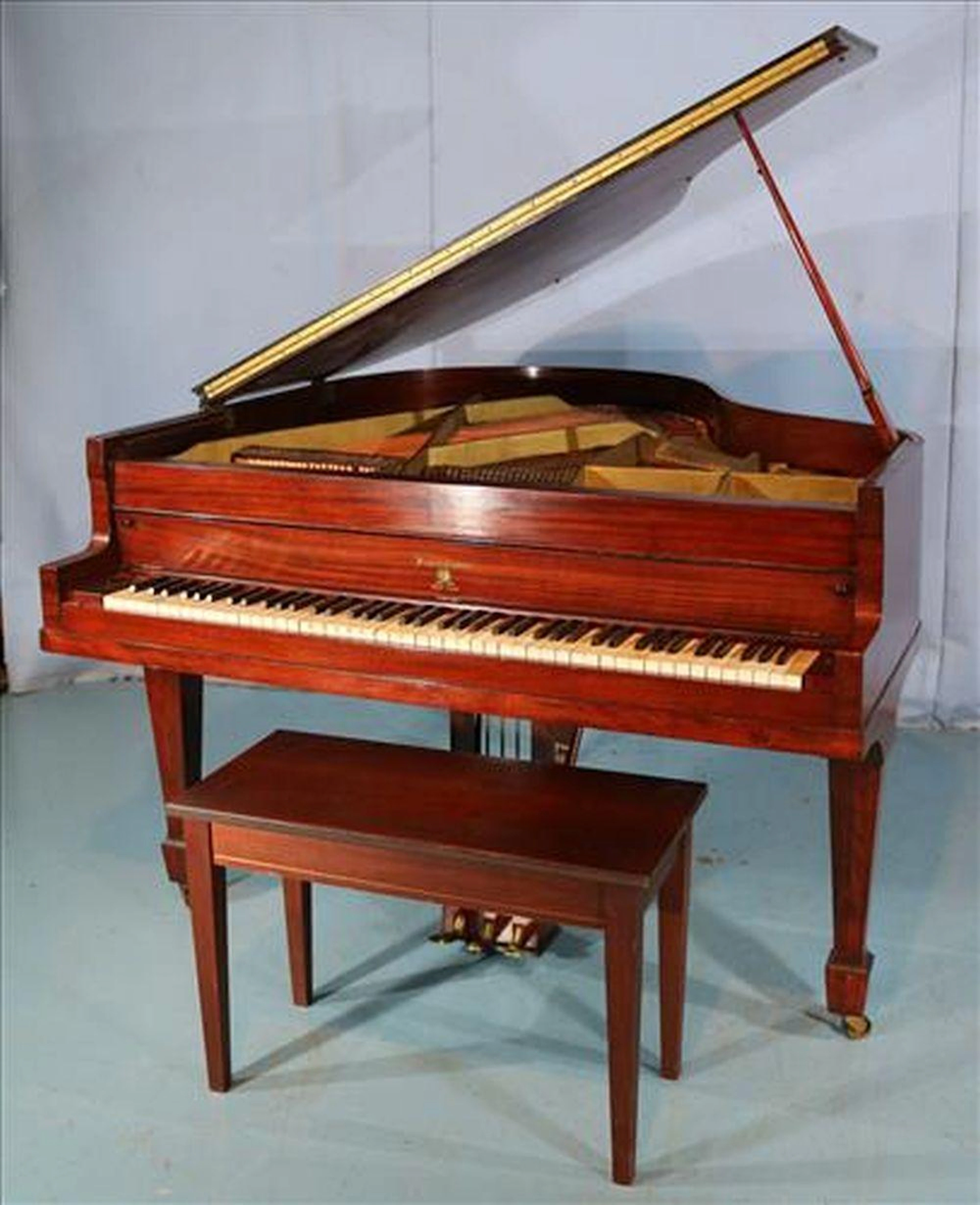 Mahogany baby grand by Francis Cornnor