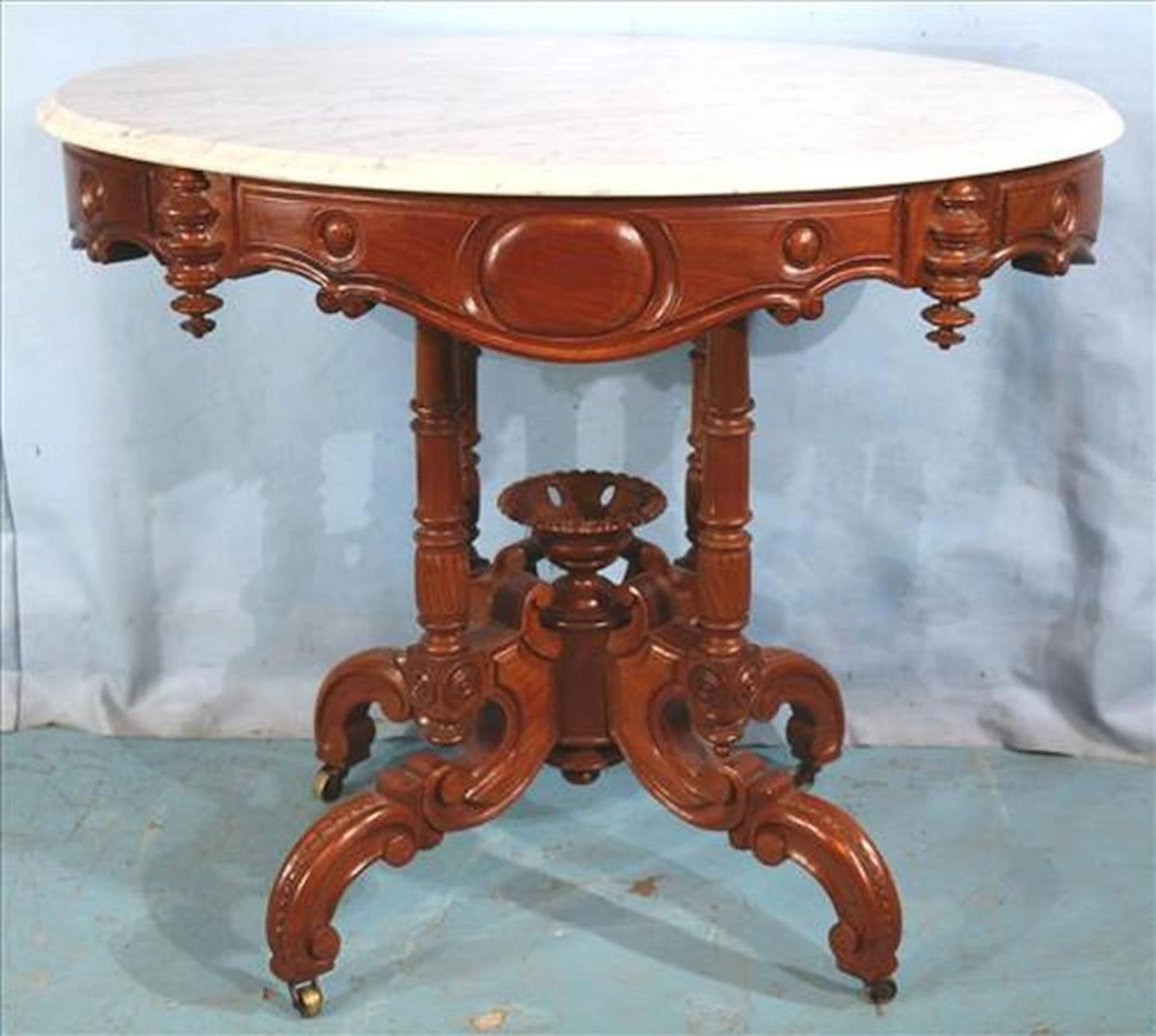 Walnut Victorian oval center table