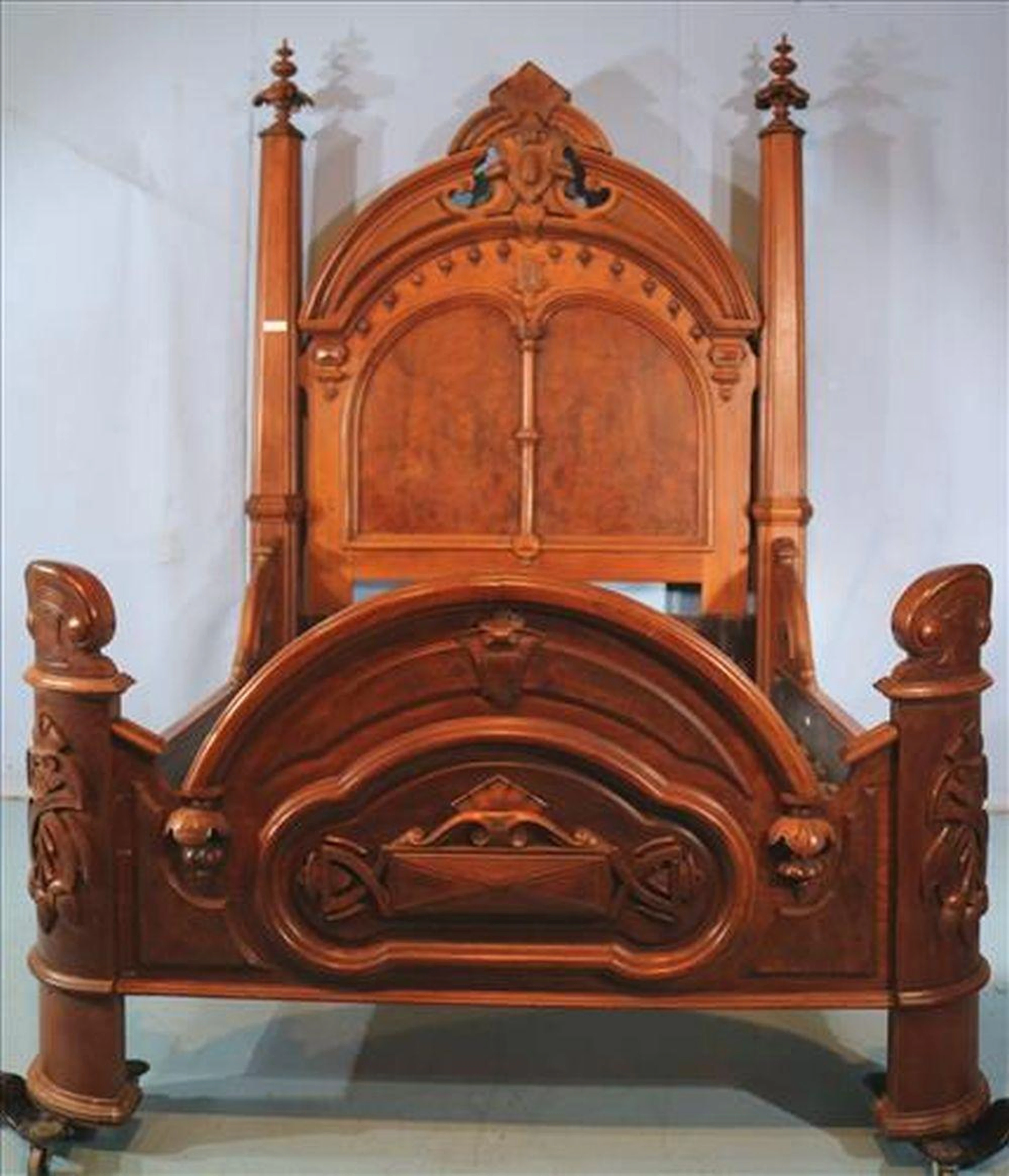 Walnut Victorian high back oversized bed, carved