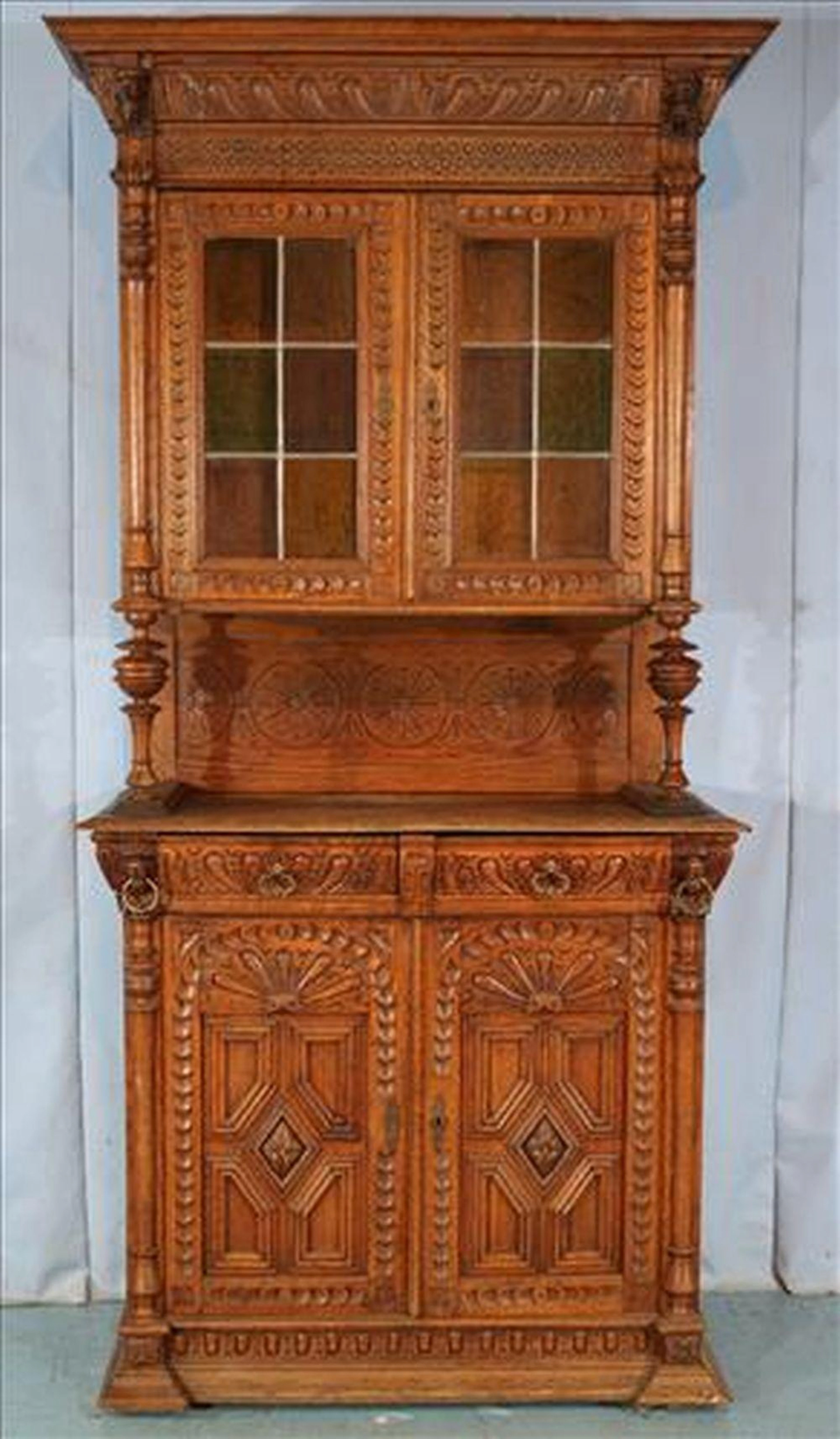 Oak English single court cabinet with leaded glass doors