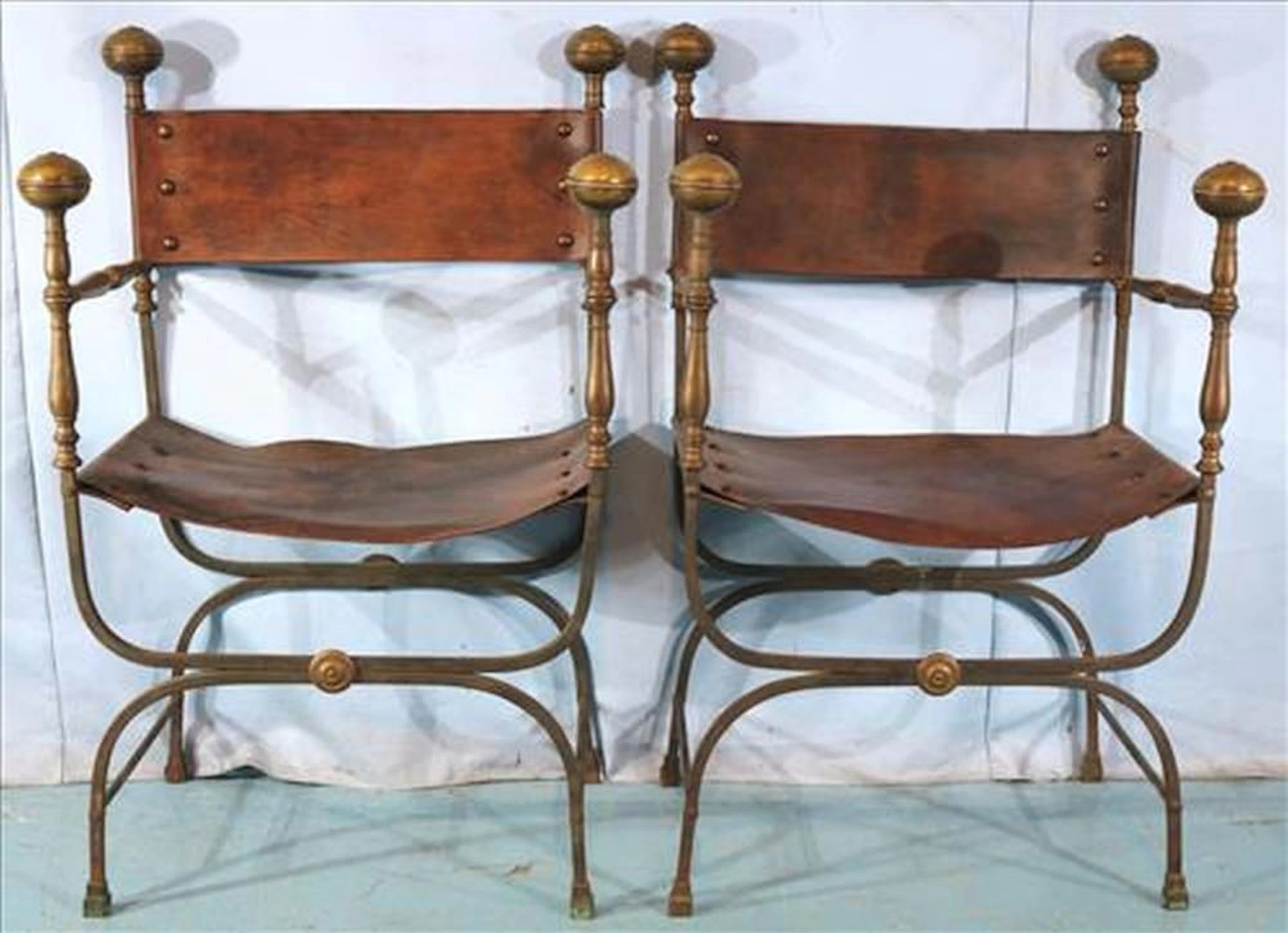 Old and unusual arm chairs with finials