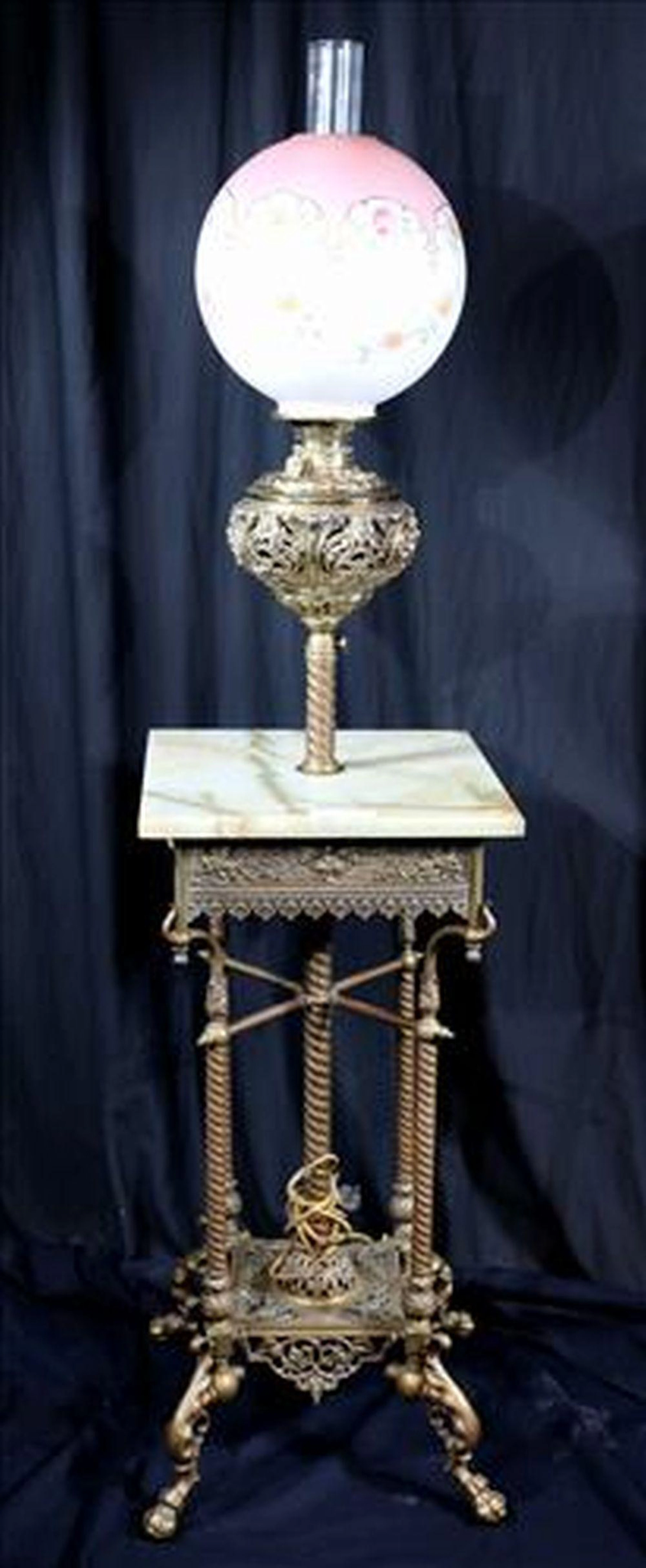 Decorative brass and onyx piano lamp
