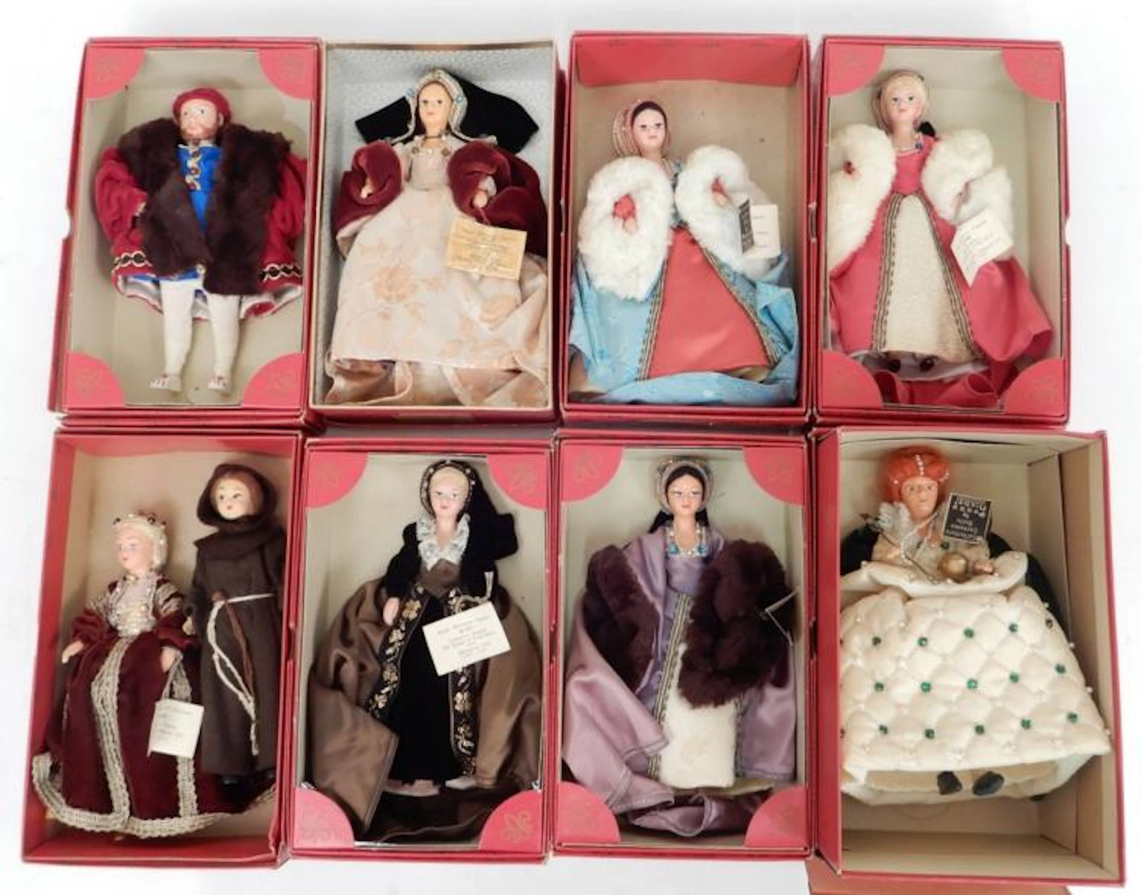Grouping of Peggy Nisbet dolls in boxes