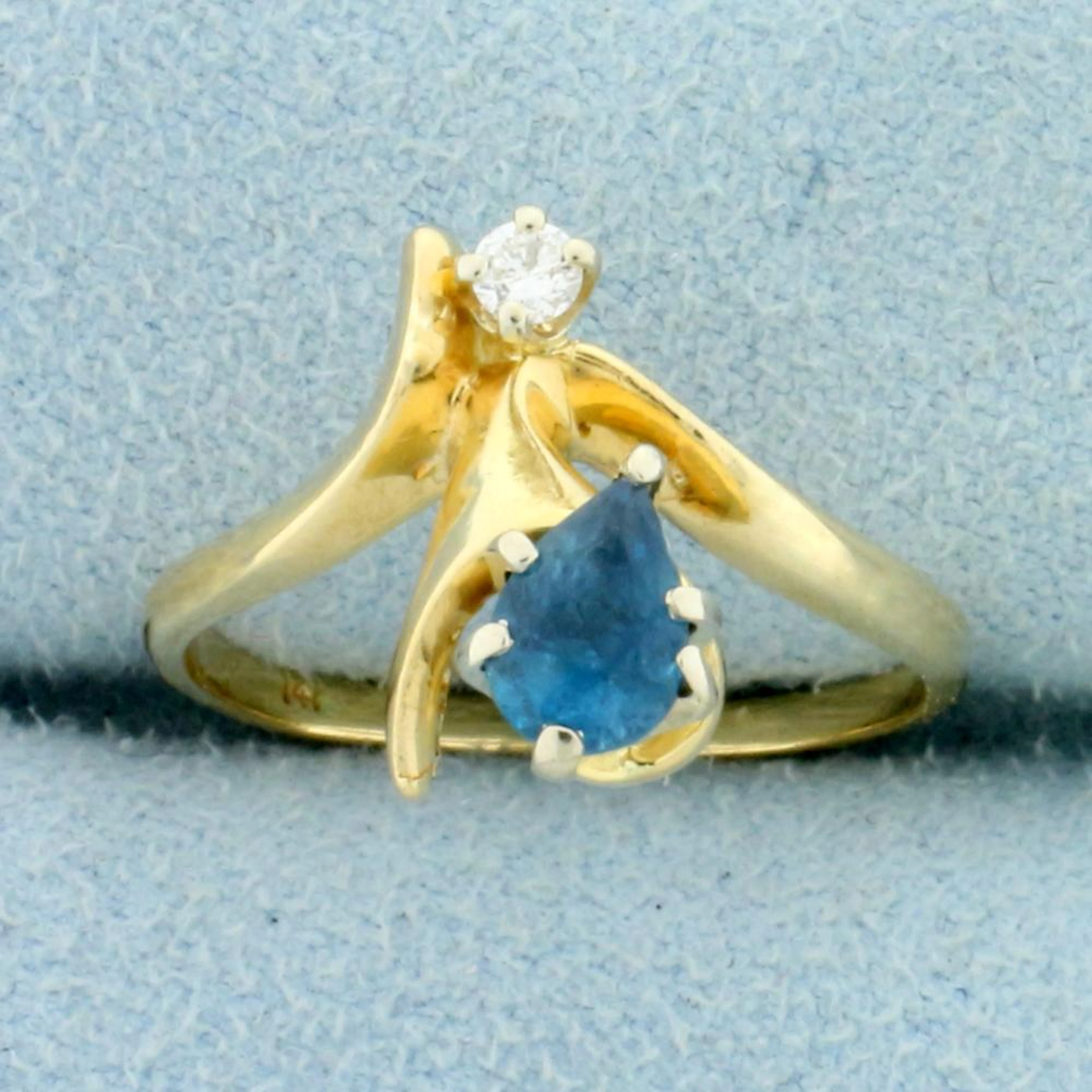 London Blue Topaz and Diamond Ring in 14K Yellow Gold