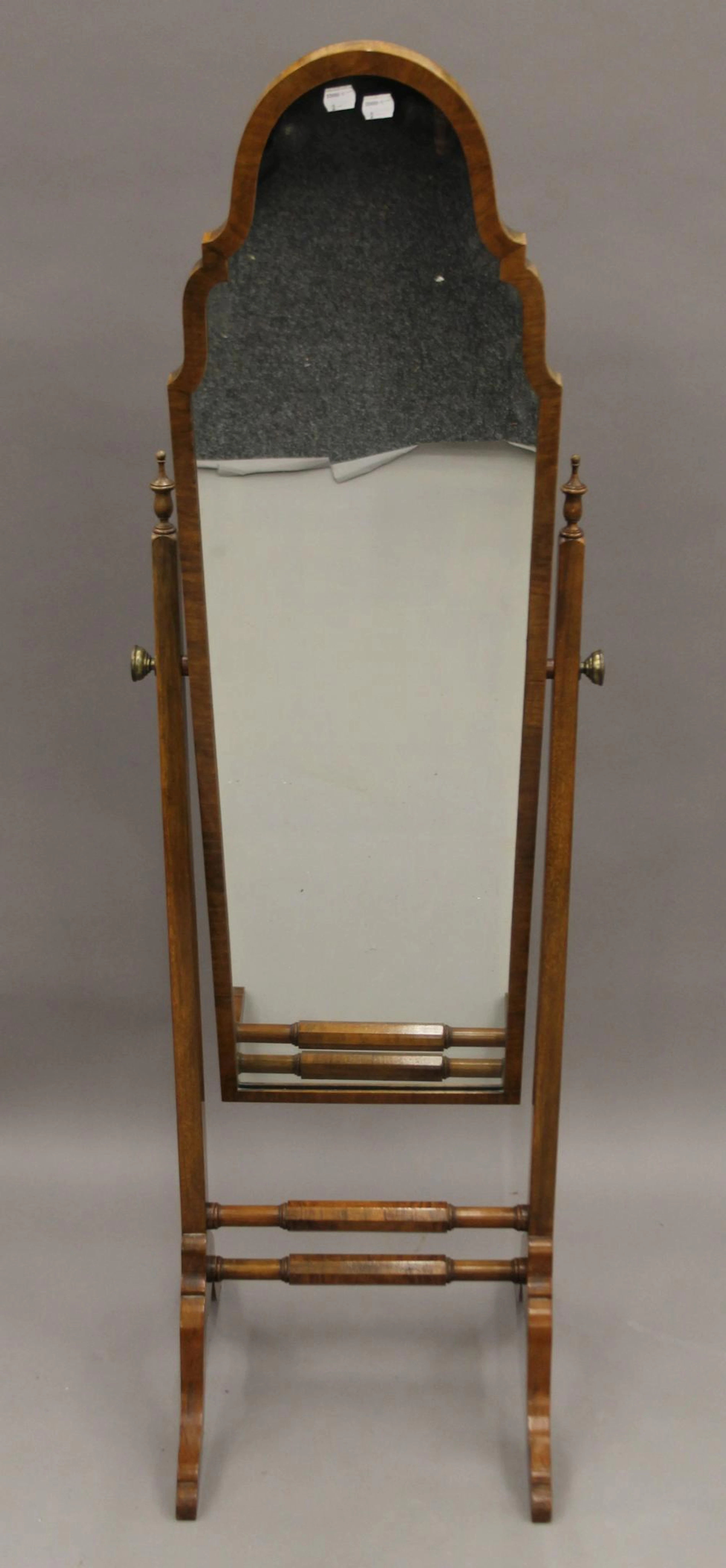 An early 20th century walnut framed cheval mirror. 156 cm high.