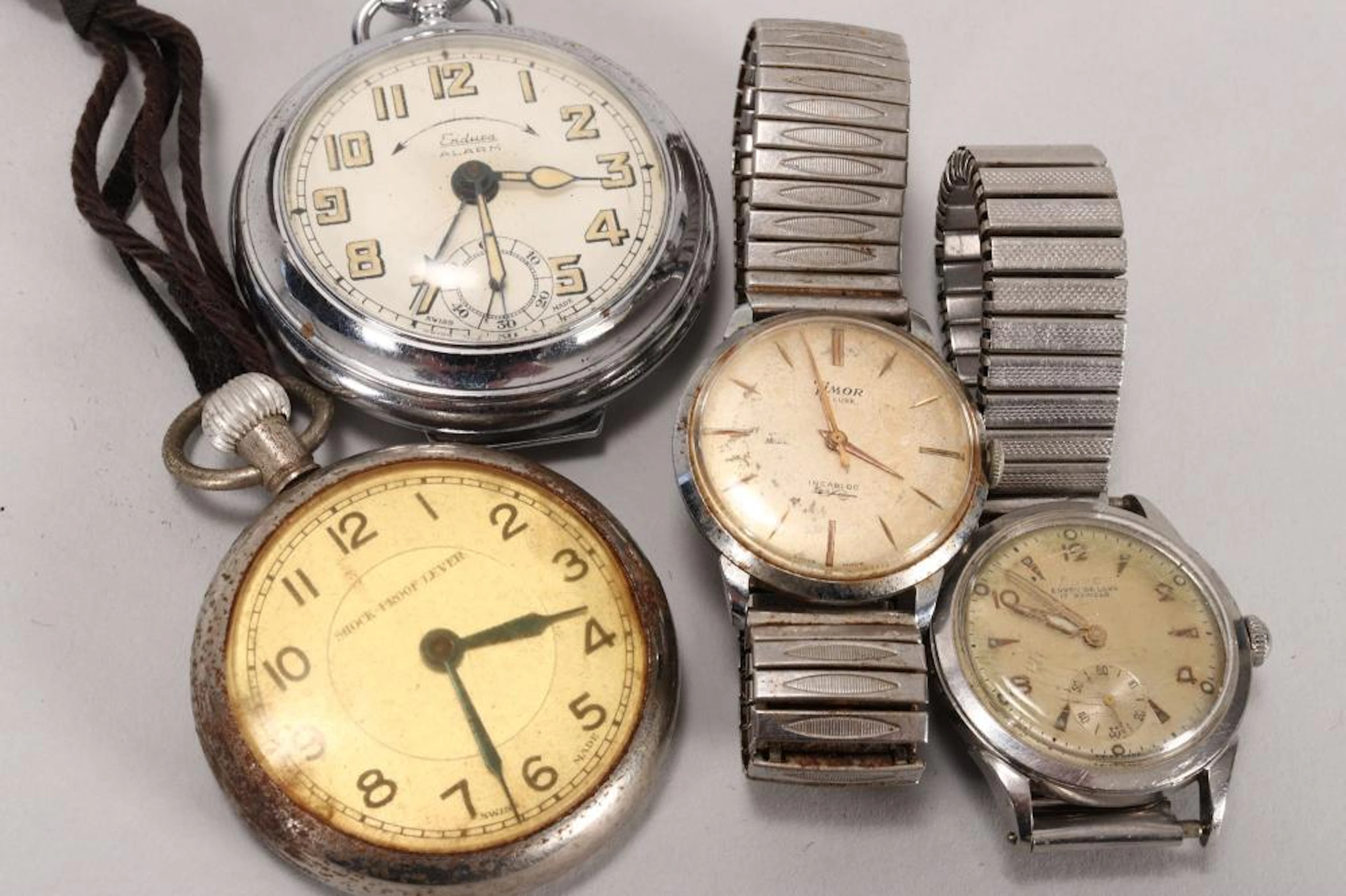 Four Gents Timepieces,