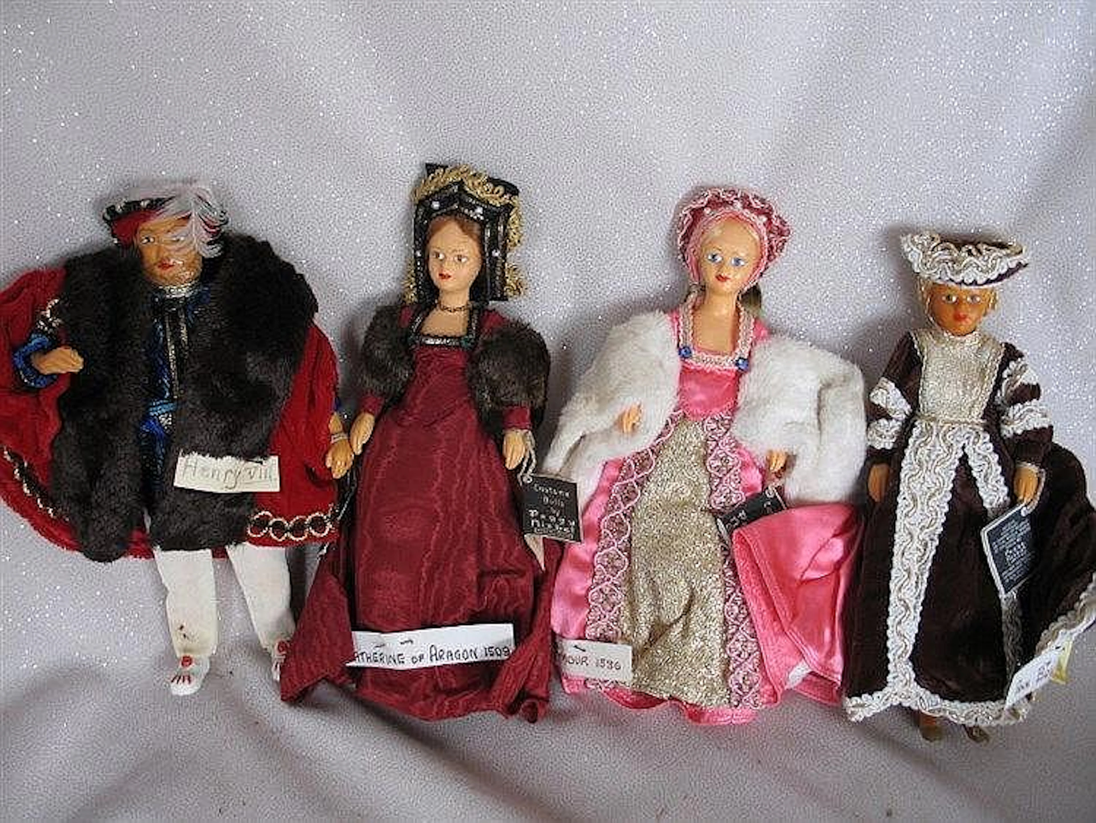Twelve Peggy Nisbet dolls