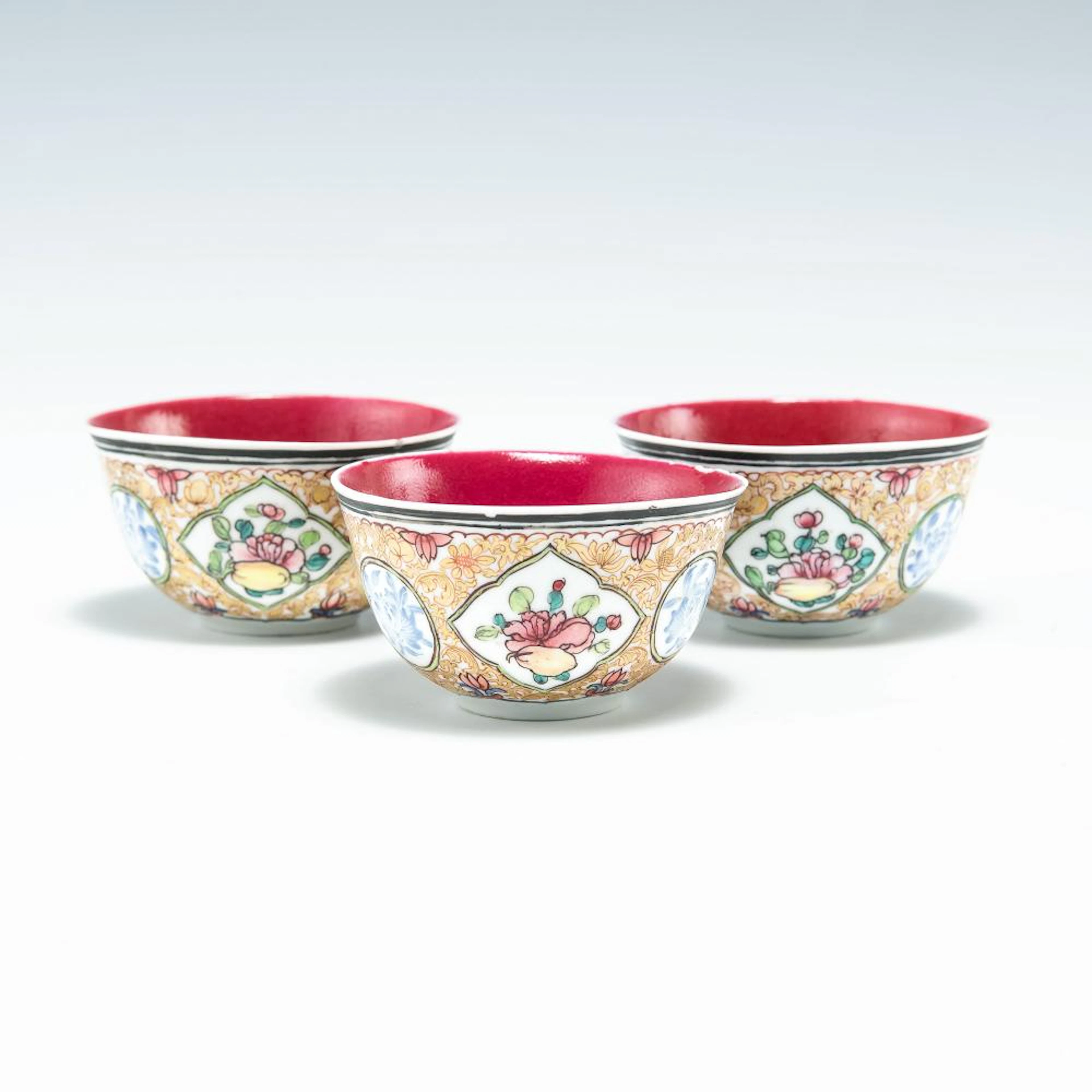 Three Chinese export falangcai cups, 18th century