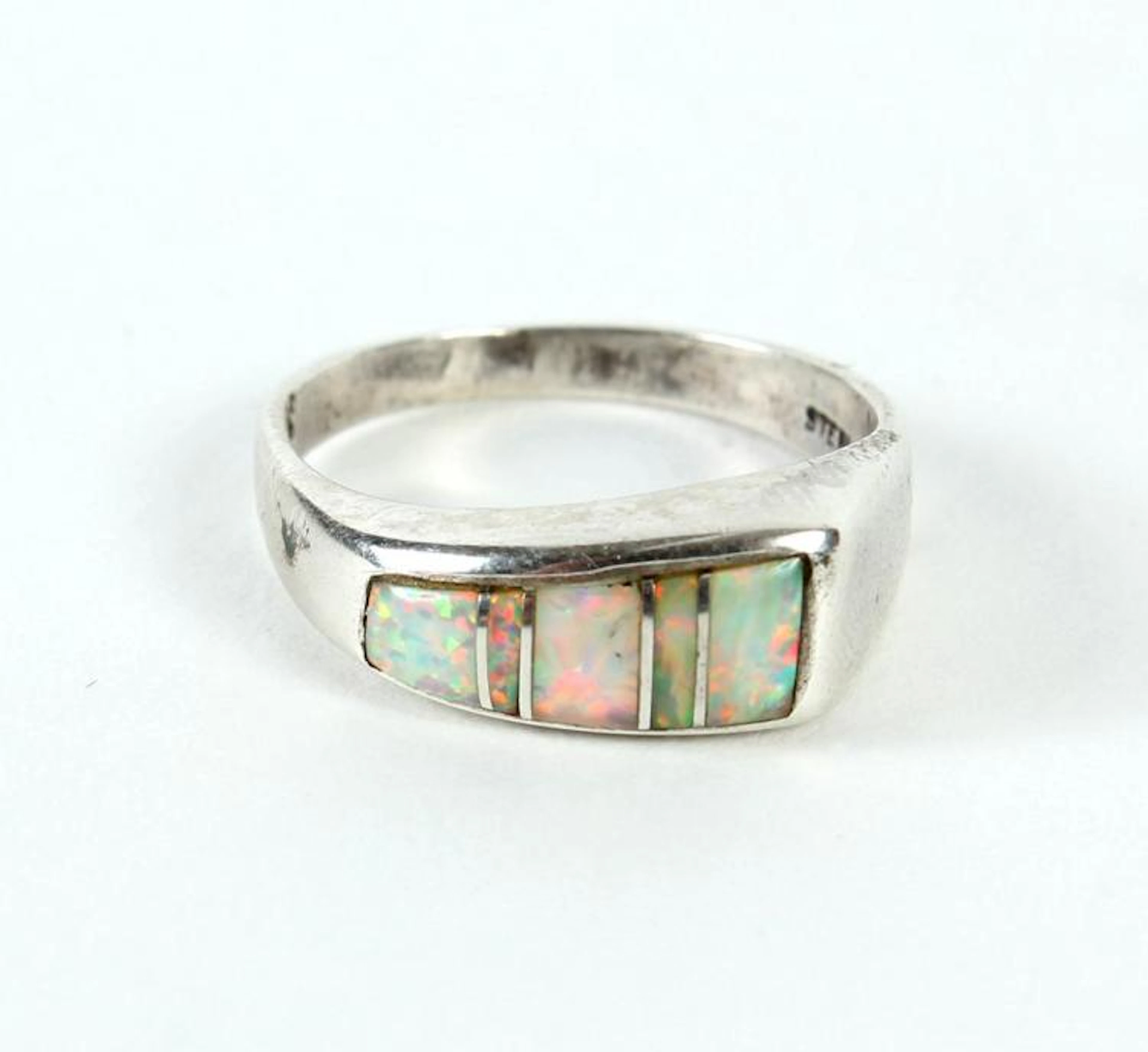 STERLING SILVER & OPAL RING - A sleek modern sterling...