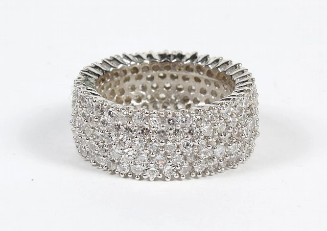 PAVE SET ZIRCON AND STERLING SILVER RING - Wide sterling...
