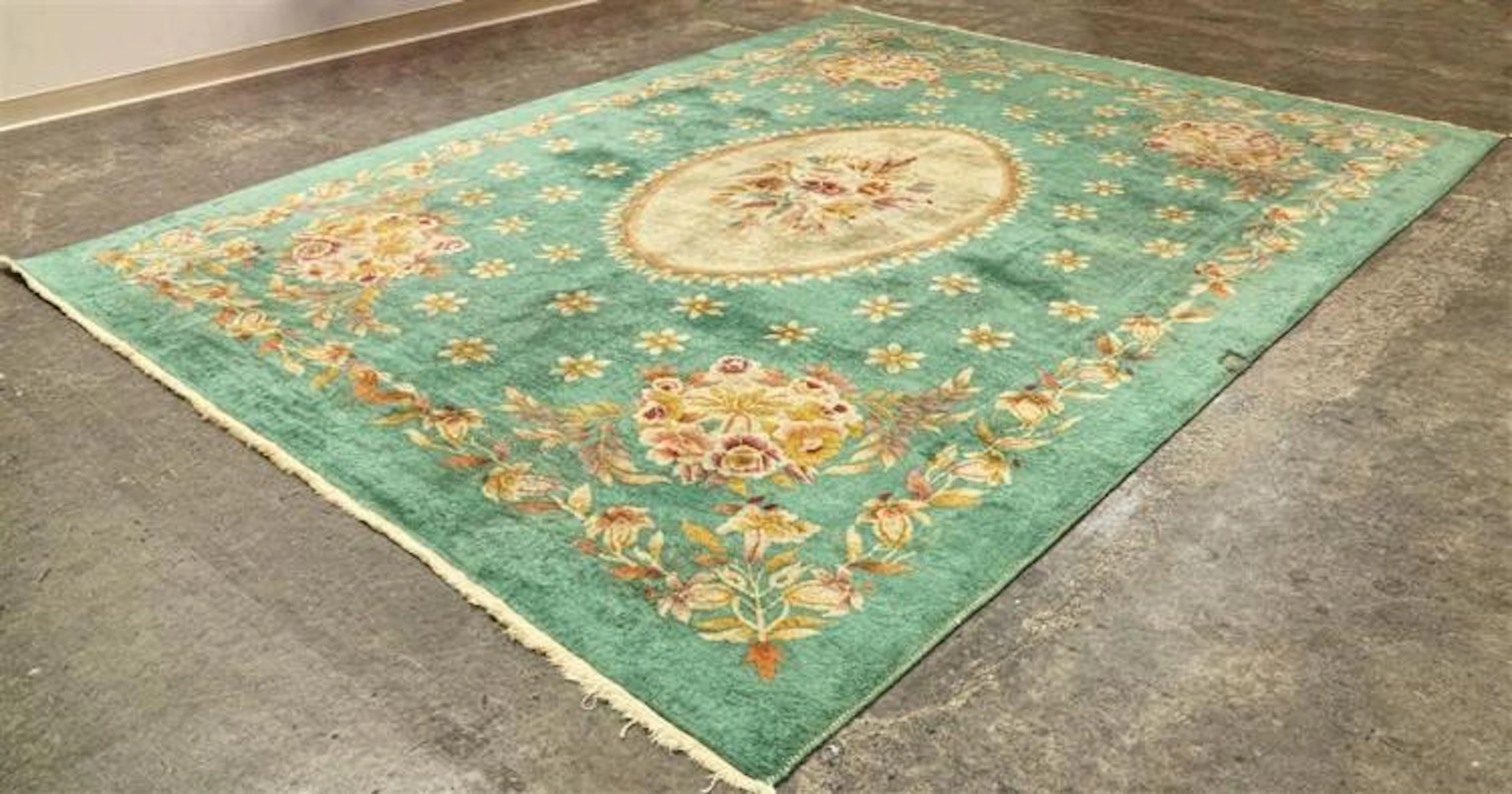 CARPET: HAND-KNOTTED INDO-CHINESE FLORAL - Wool on a...
