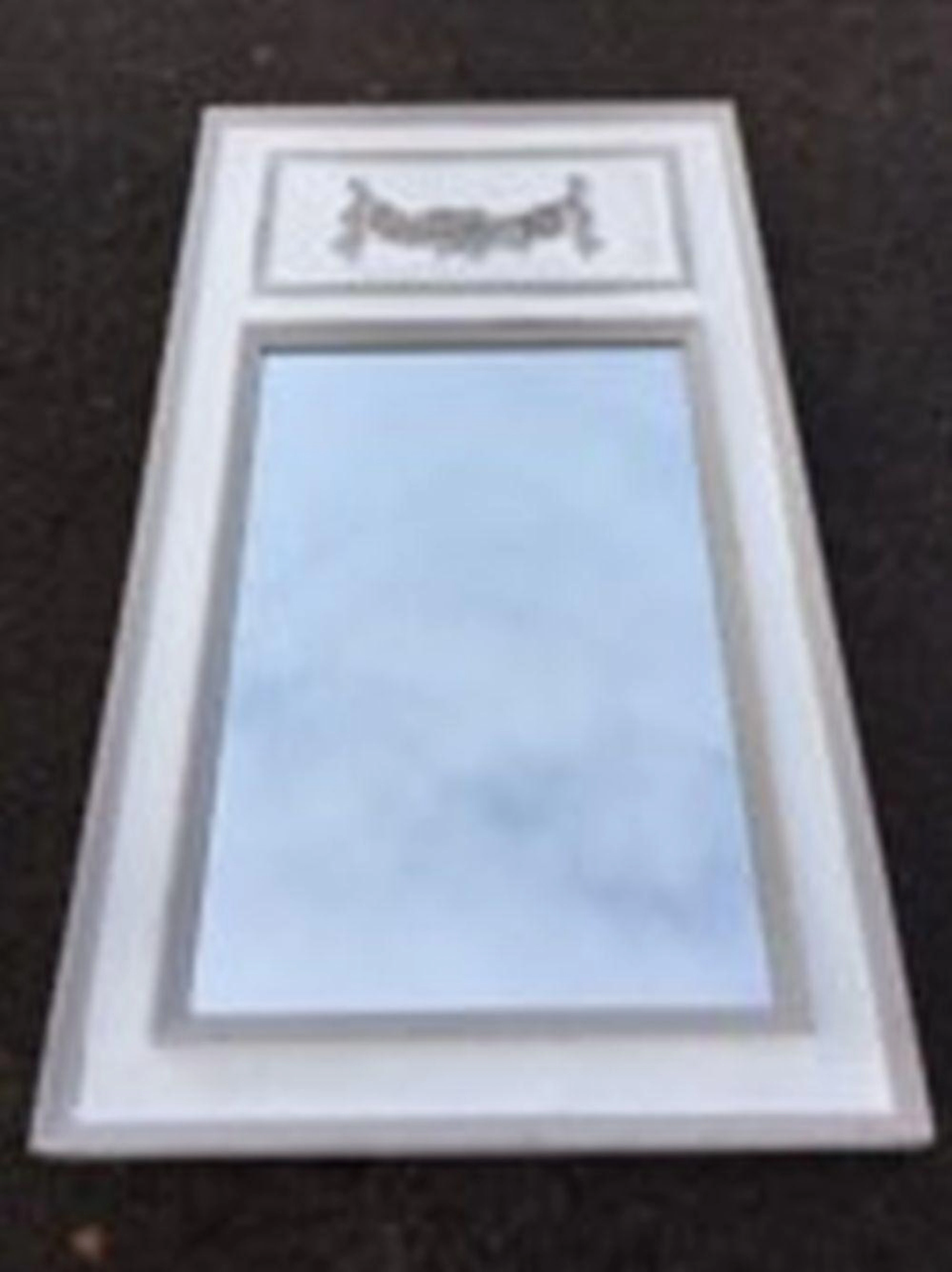 A painted hall mirror, the moulded channelled frame with rectangular plate