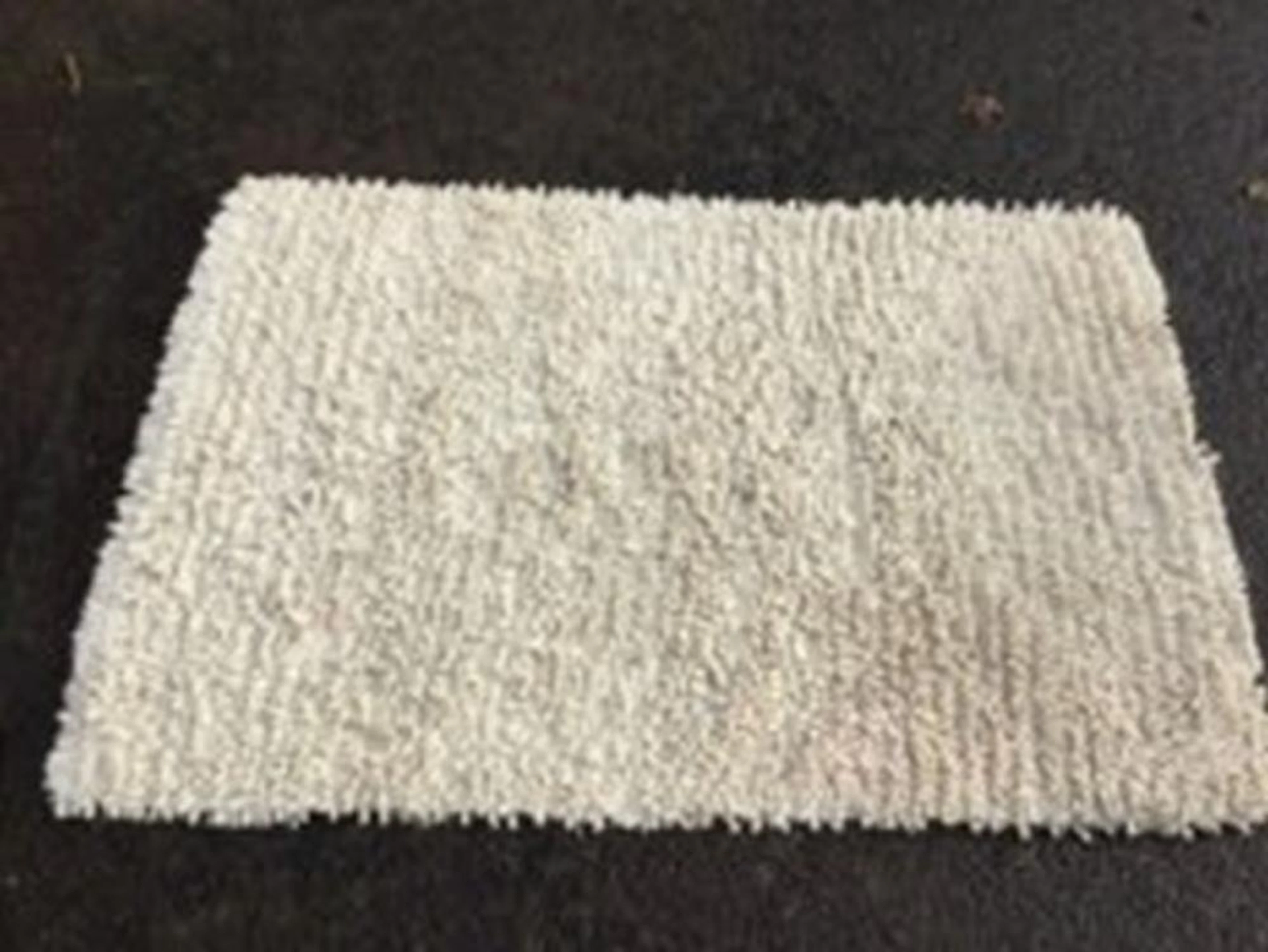 An Indian made Laura Ashley wool & cotton tufted Frankie rug. (72in x 49in