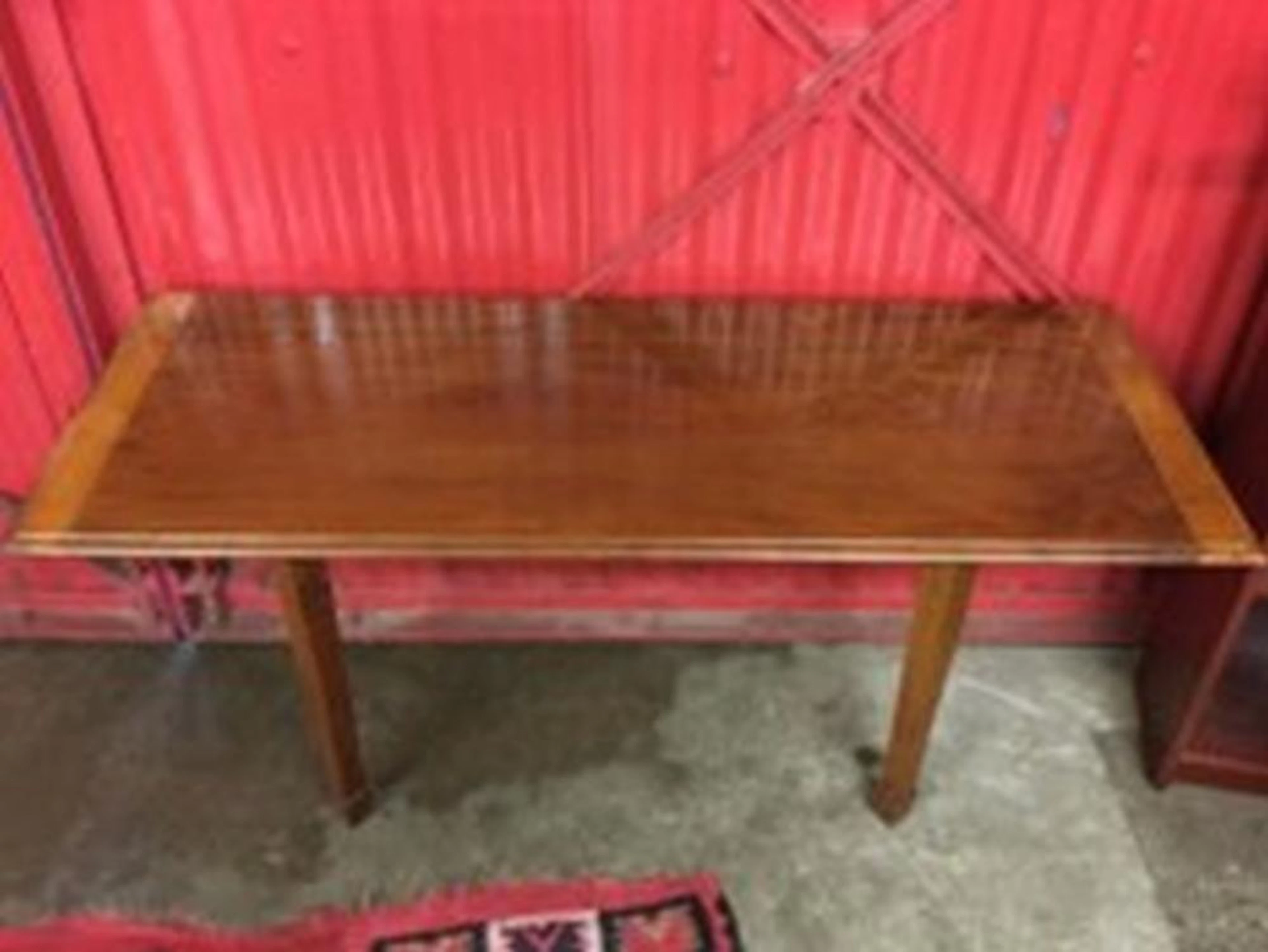 A nineteenth century mahogany butlers table, the wallmounting rectangular