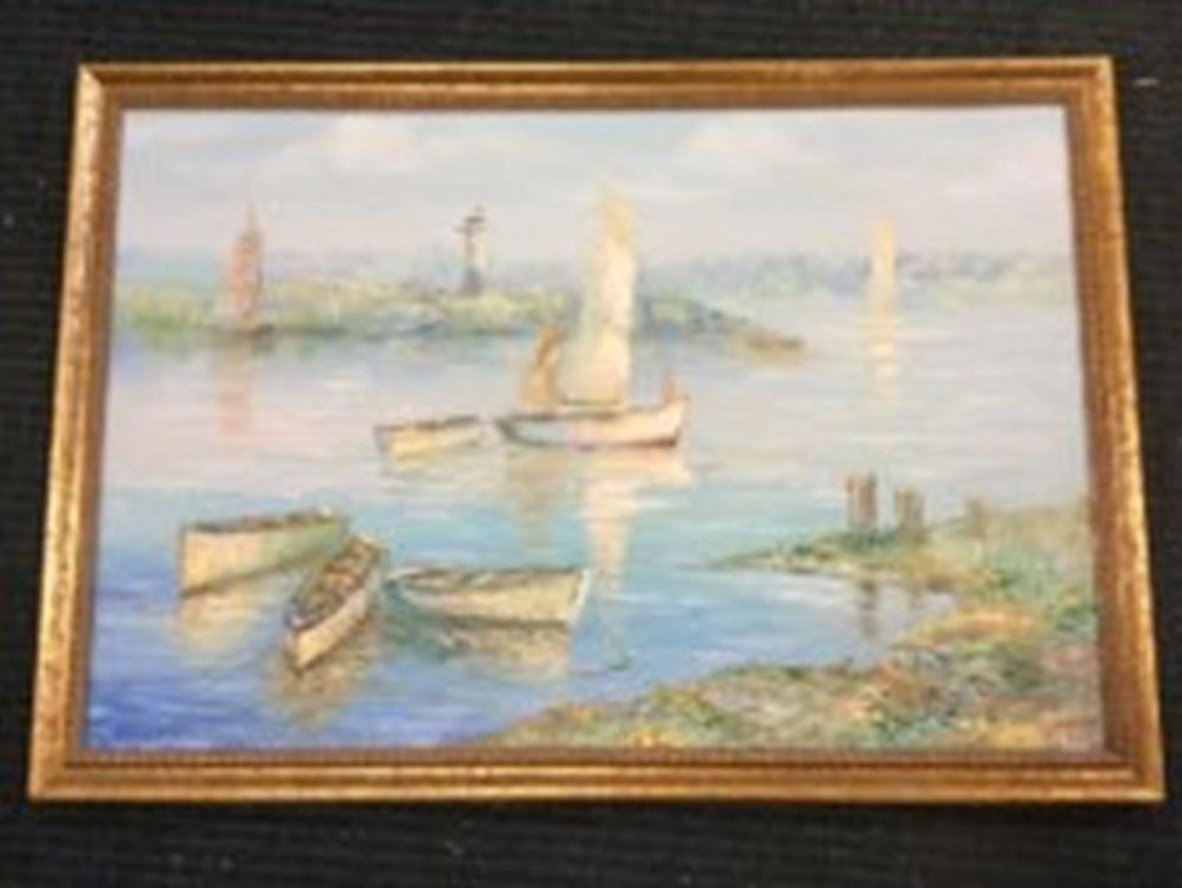 Oil on board, coastal view with boats and lighthouse, signed indistinctly,