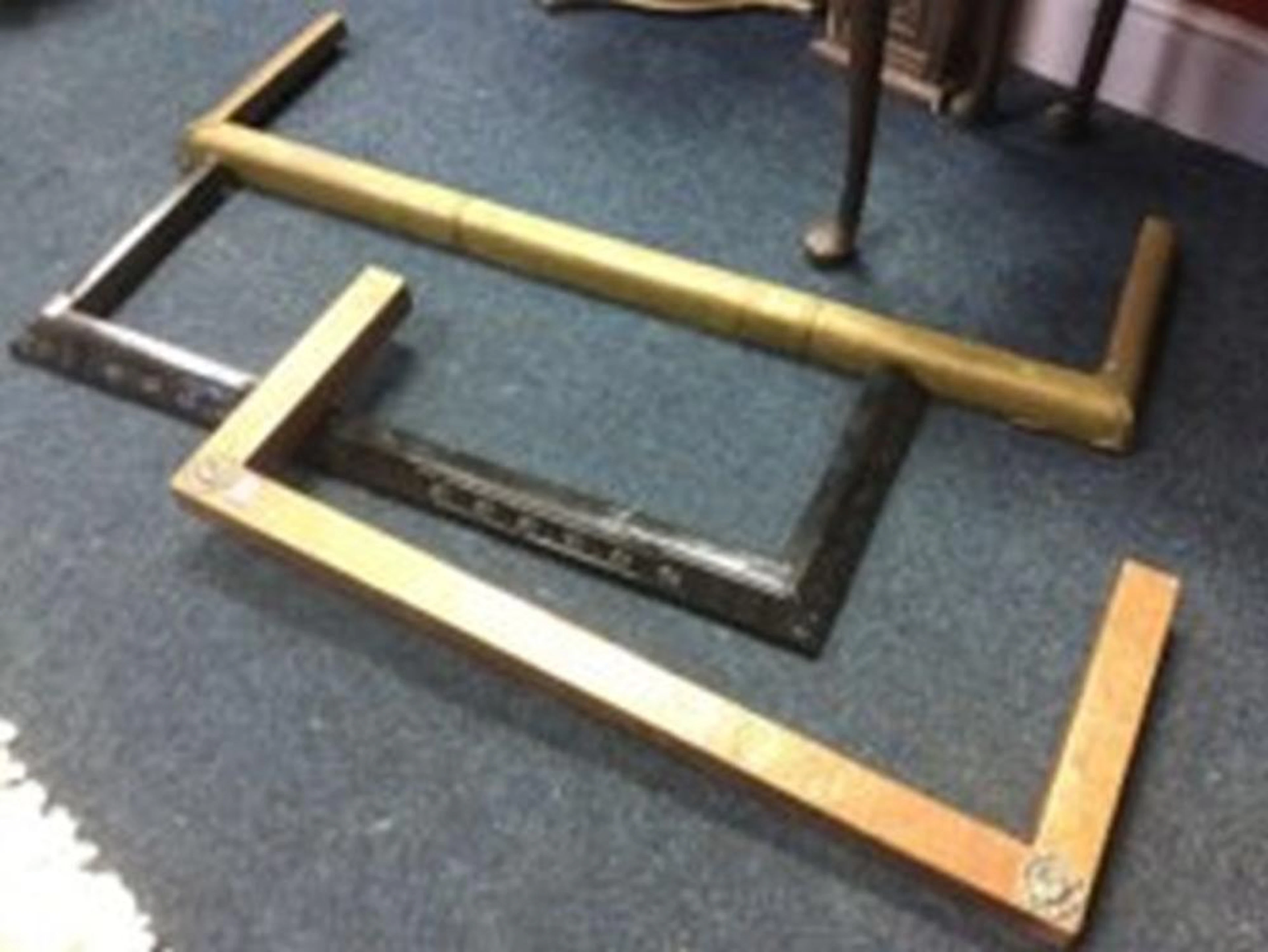 A square section copper fender with silver plated flowerhead corner mounts