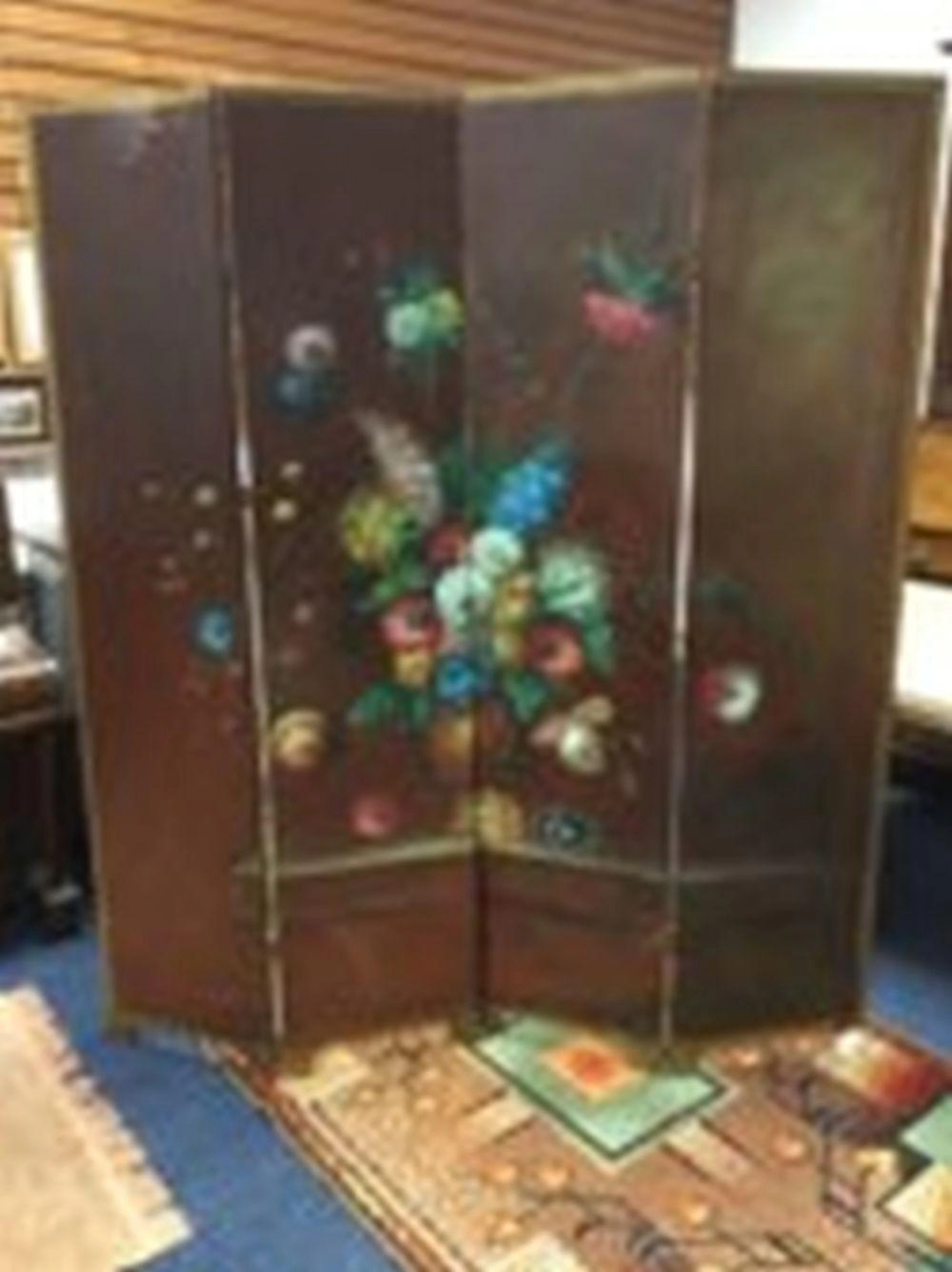 A four-fold screen handpainted in oils with still life vase of flowers, wit