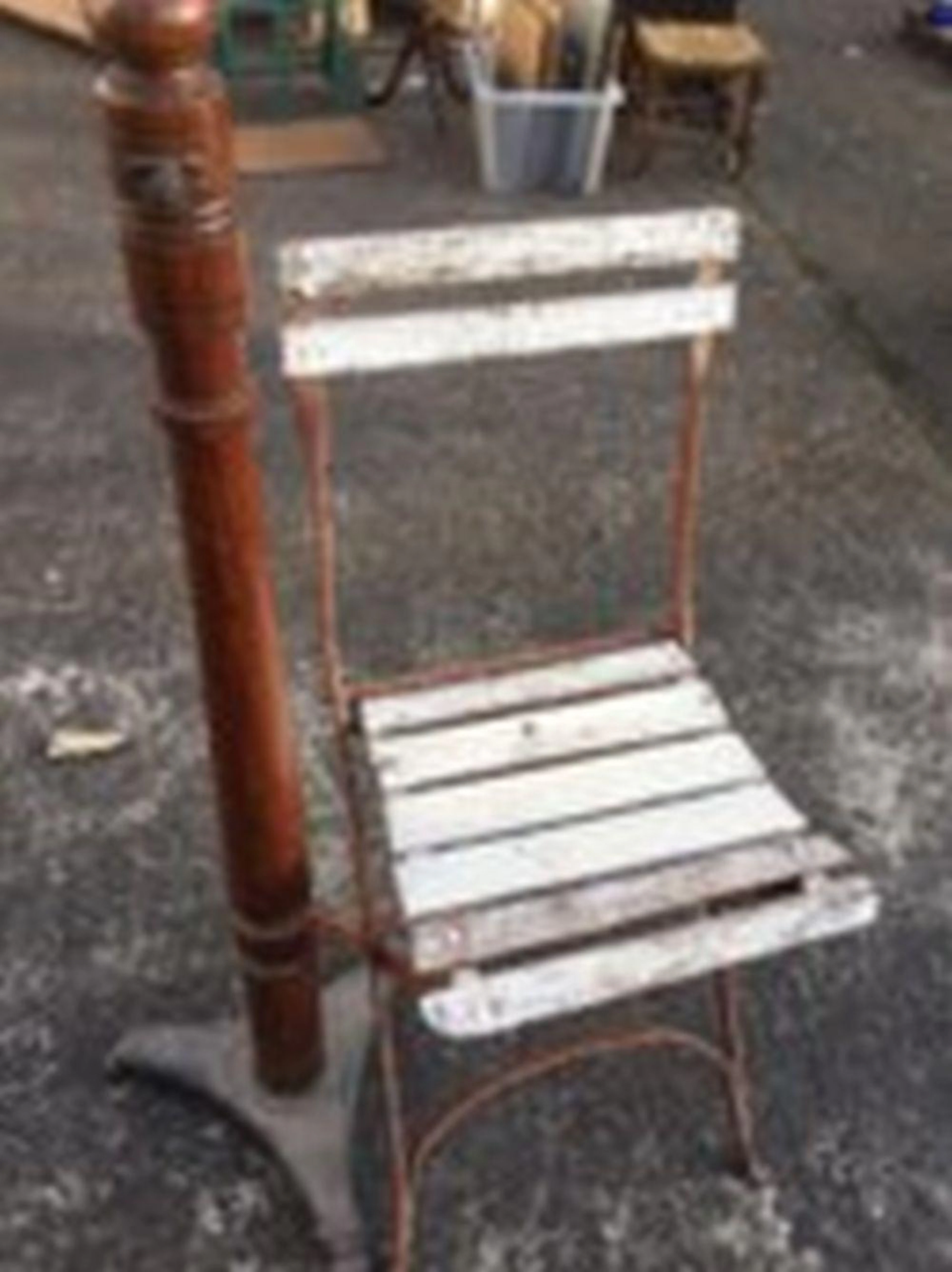 A Victorian pitch pine stand, the tapering turned column on cast iron trip